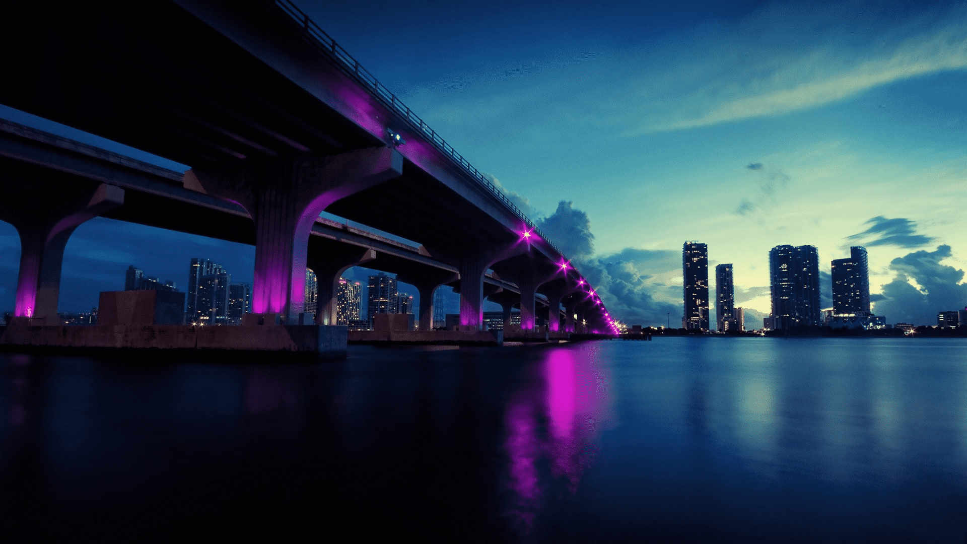 A bridge over water with lights on it - Miami