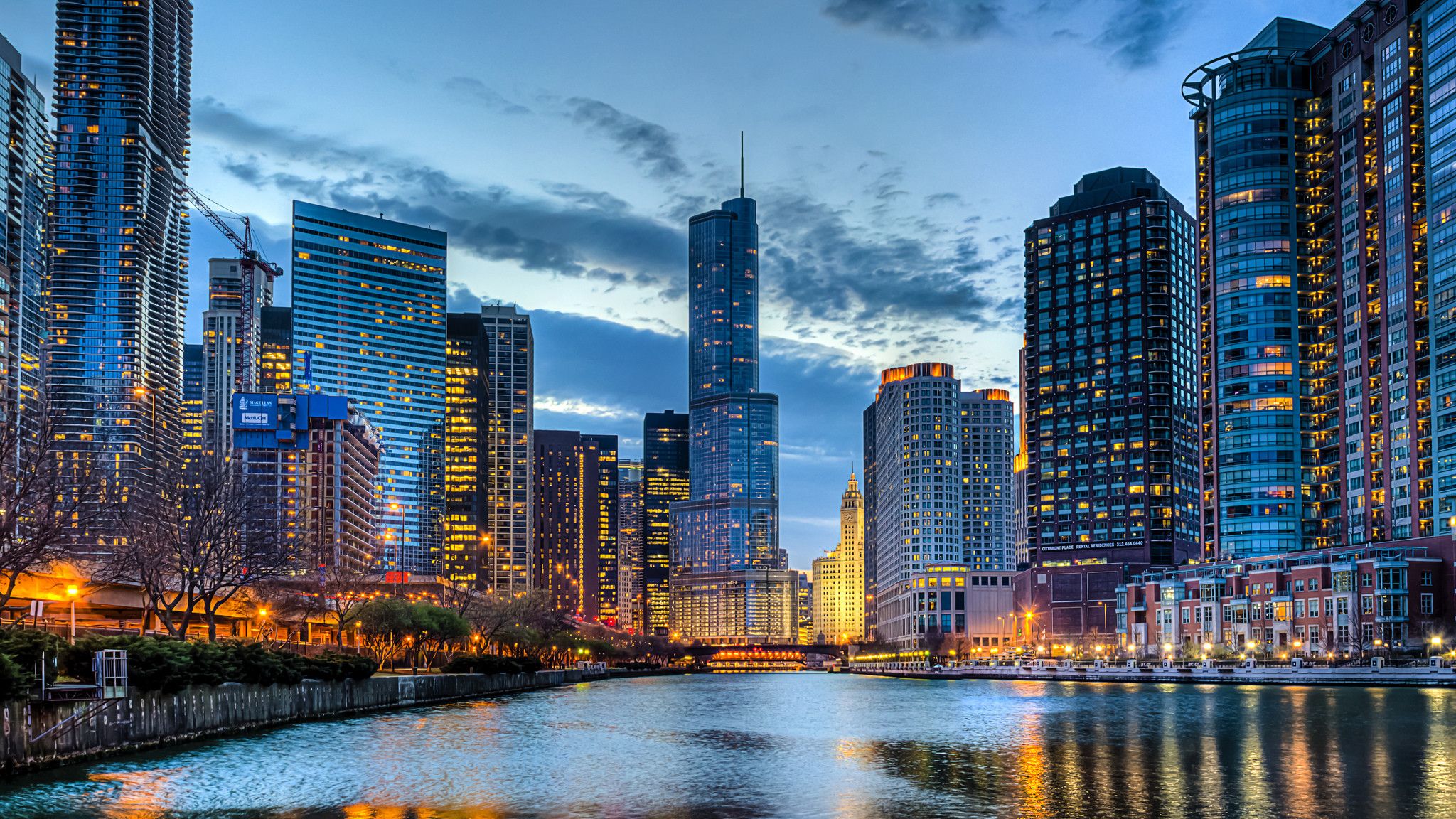 A city skyline with buildings and water - Chicago