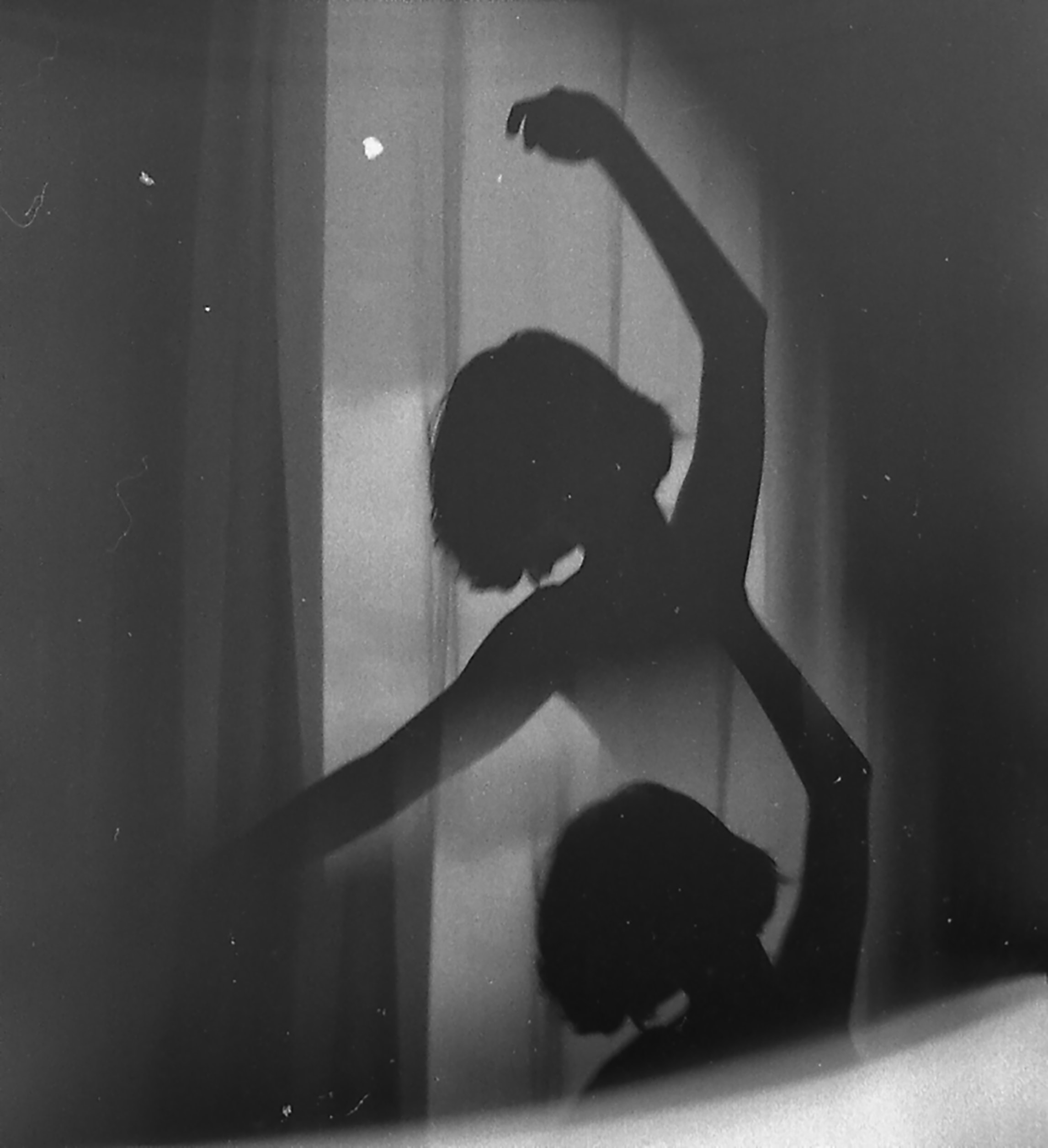 A woman is dancing in front of the window - Black quotes