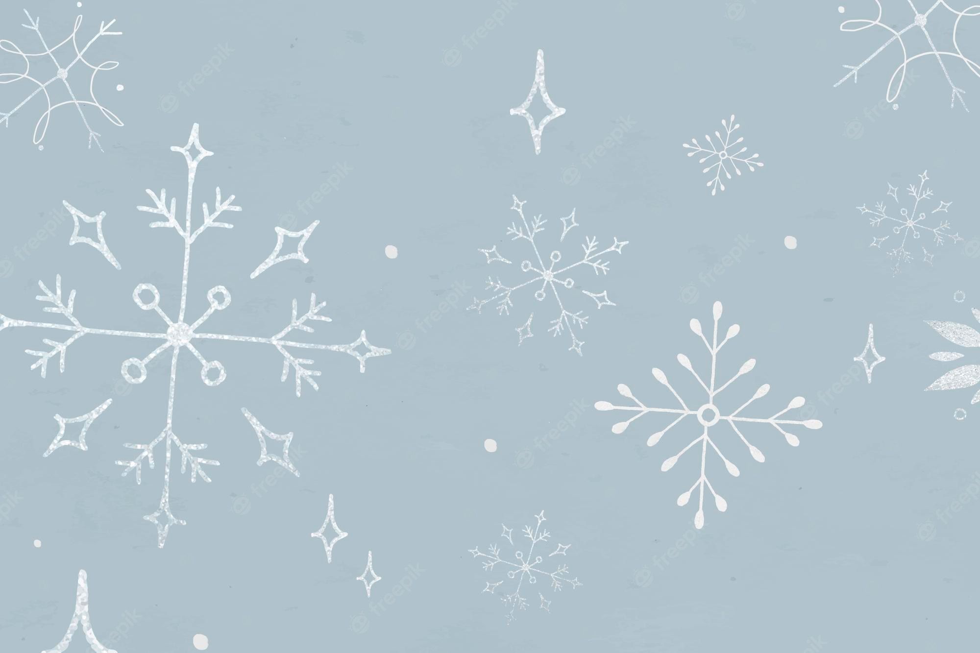 A blue background with white snowflakes - Snowflake