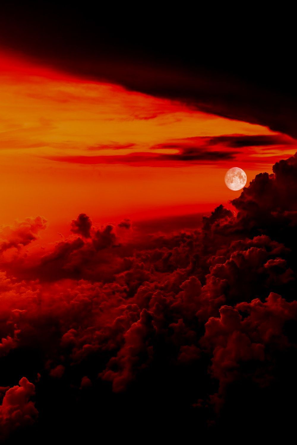 A red sunset with clouds in the background - Dark orange