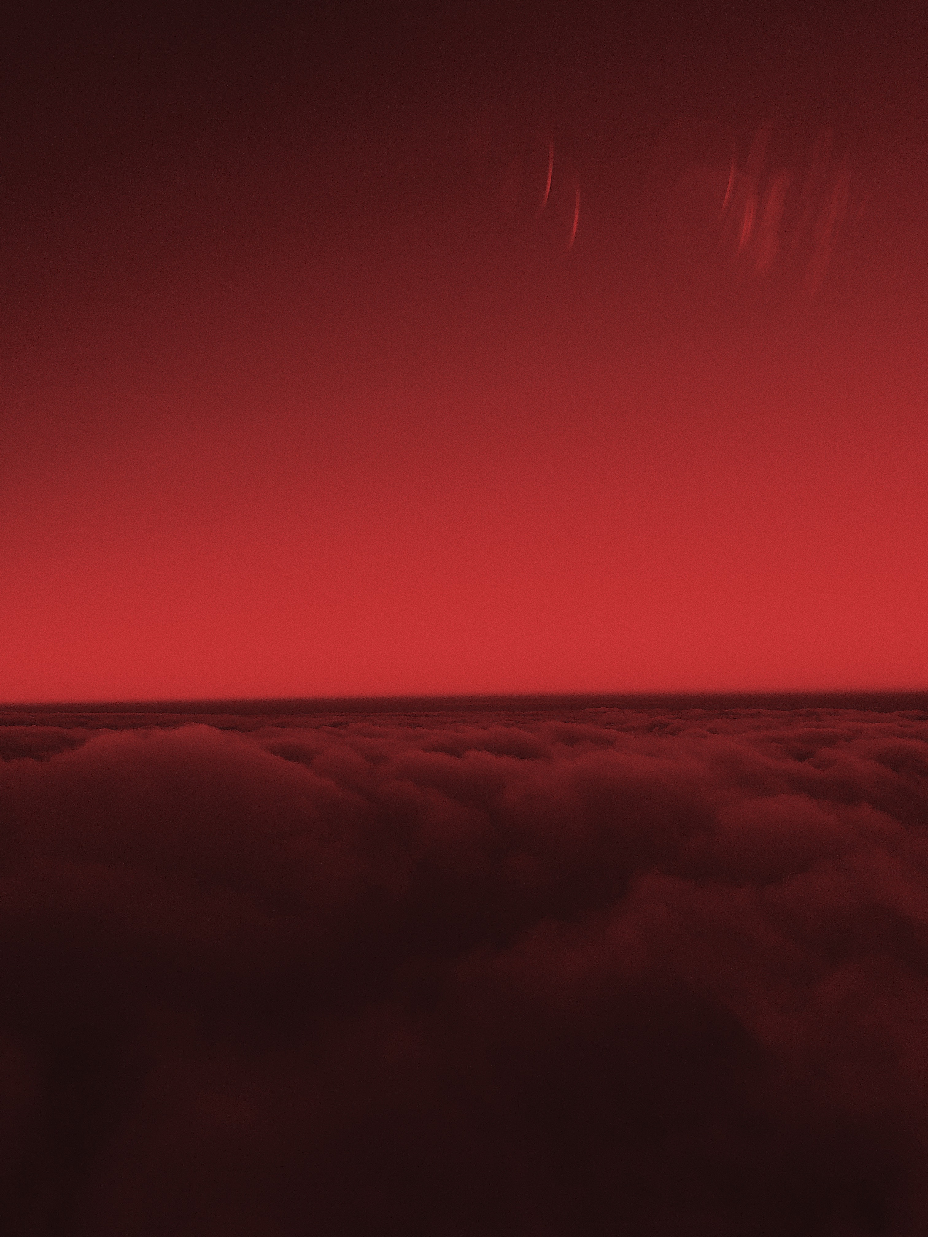 A red sky with clouds - Light red