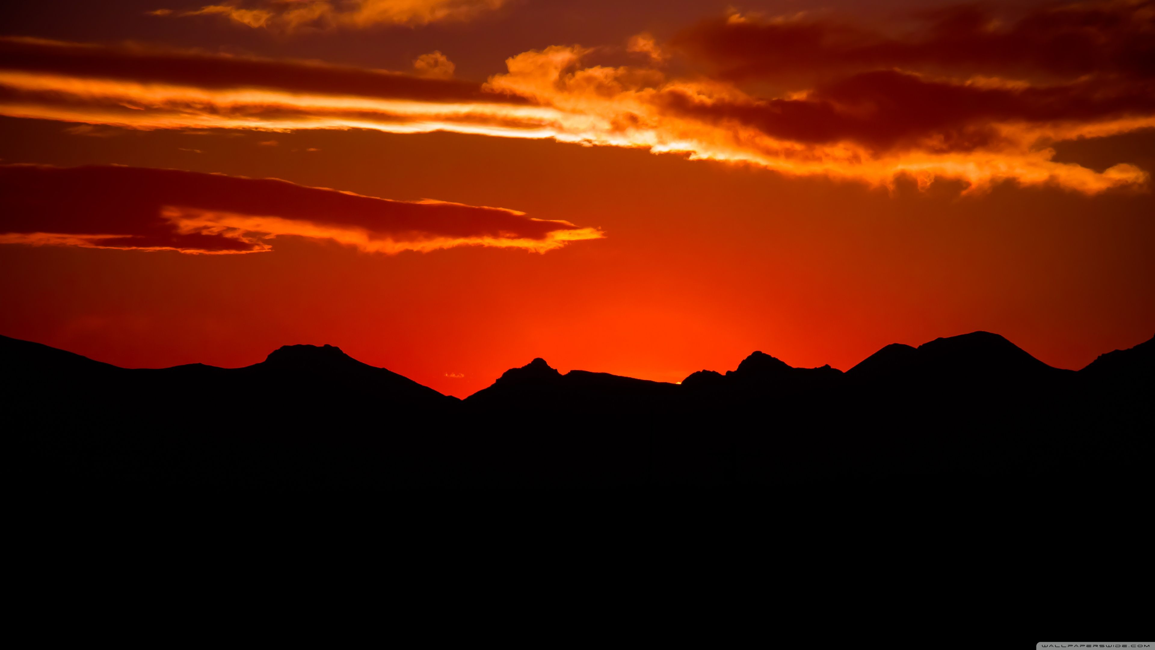 A red sunset over the mountains wallpaper 2560x1600 - Dark orange