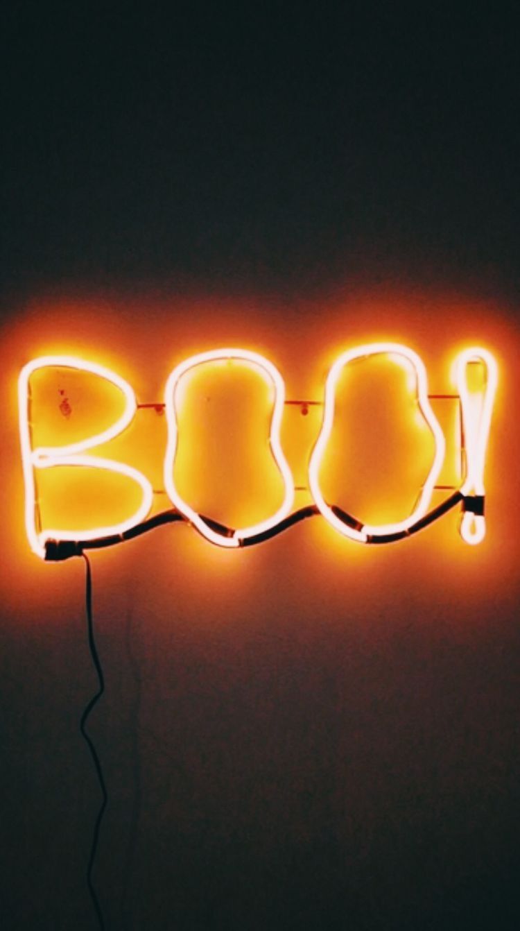 A neon sign that says boo - Dark orange