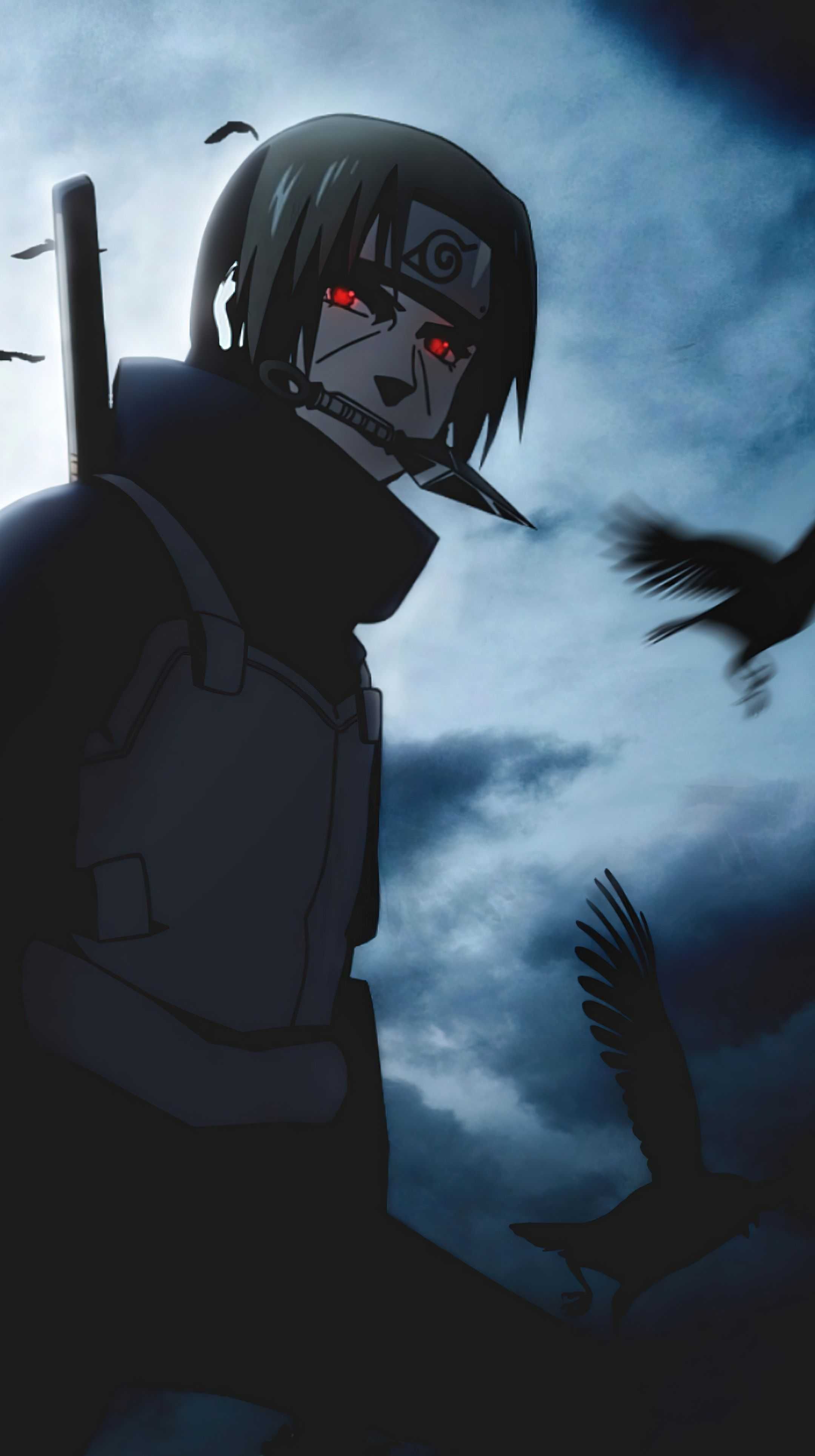 A person with red eyes and black hair - Itachi Uchiha