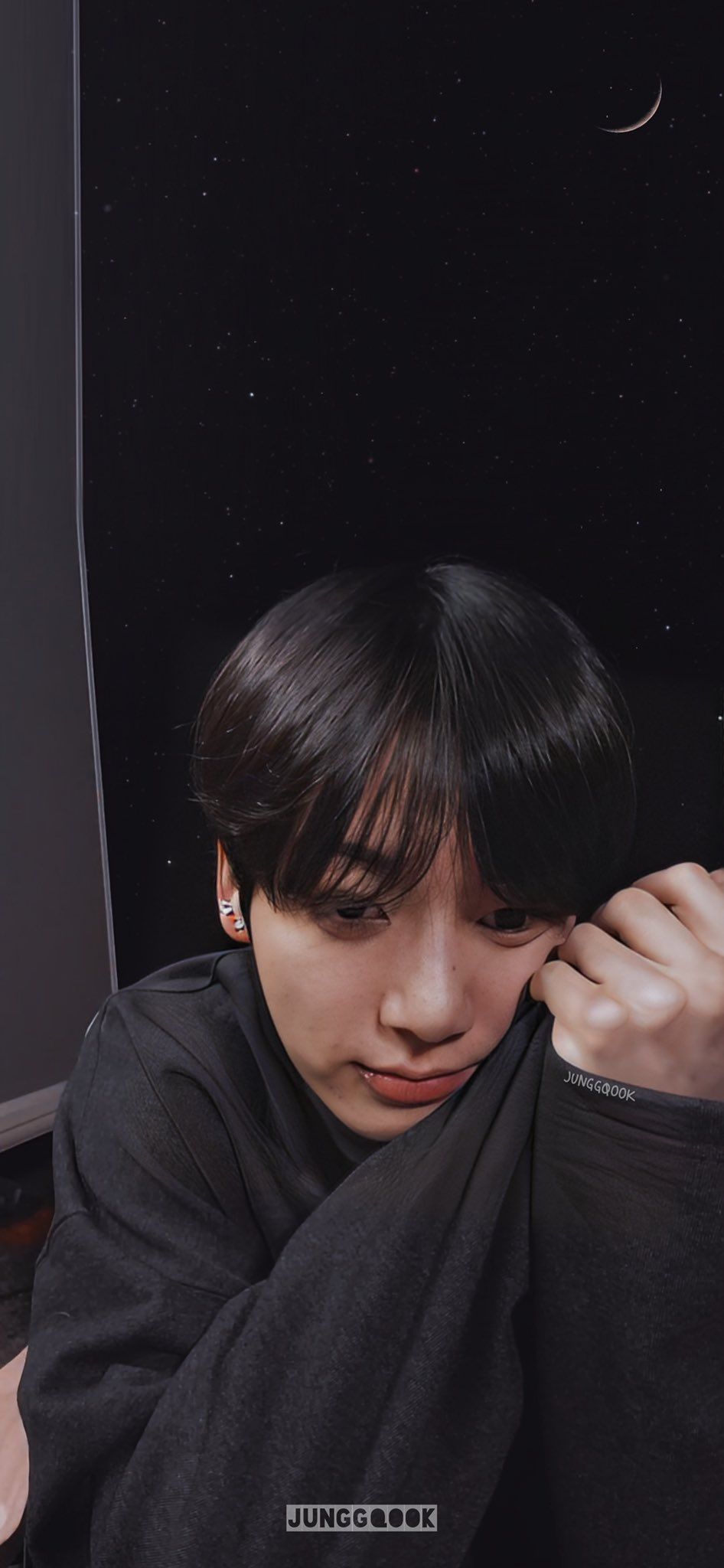 A young man is sitting in front of his computer - Jungkook