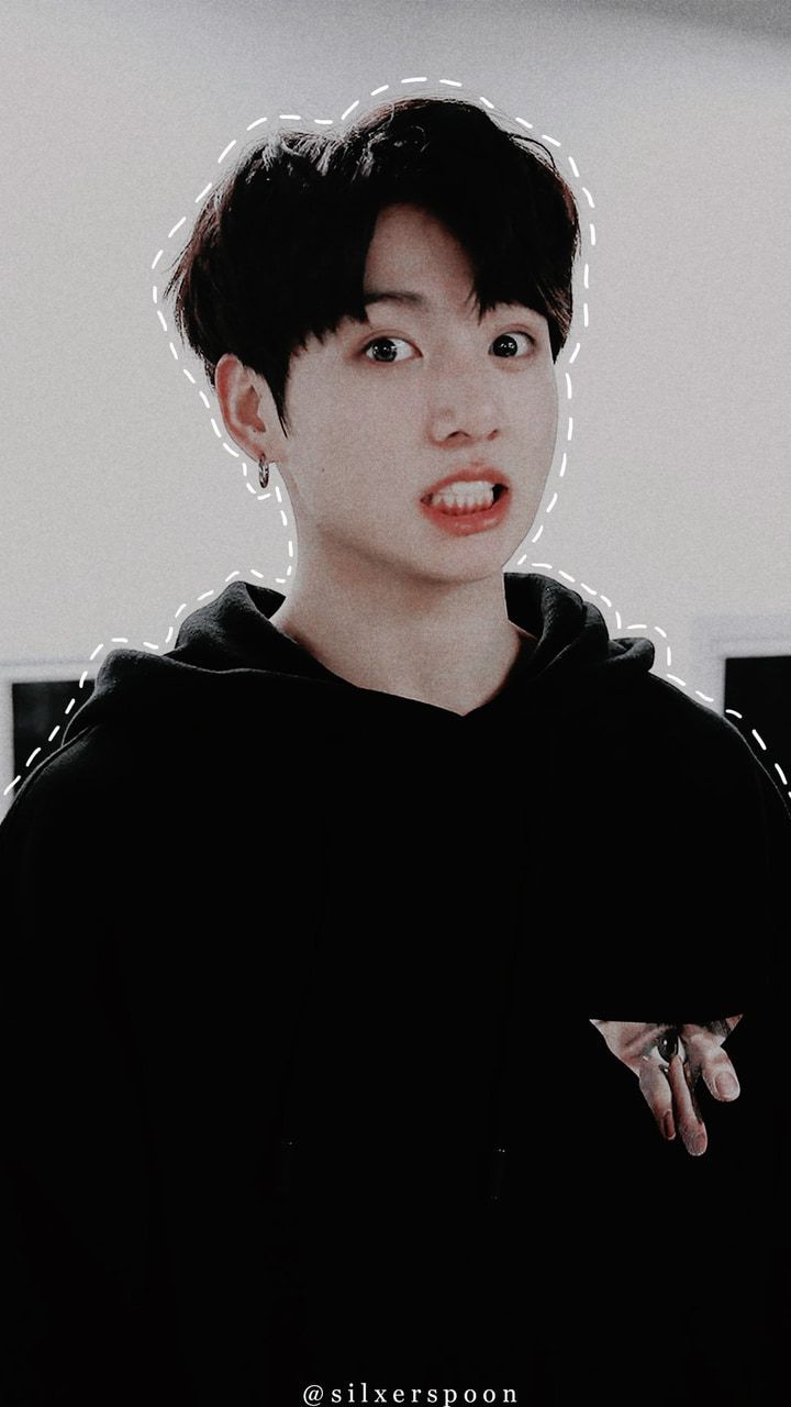A person with black hair and an angry expression - Jungkook