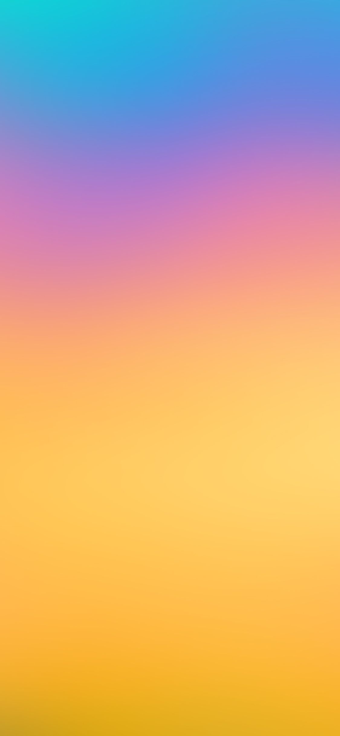A sunset with a gradient of blue, purple, yellow, and orange. - Bright