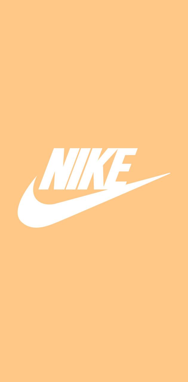 A nike logo on an orange background - Nike
