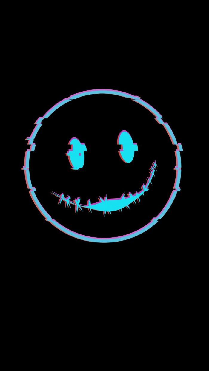A blue and purple smiley face on black background - Smile