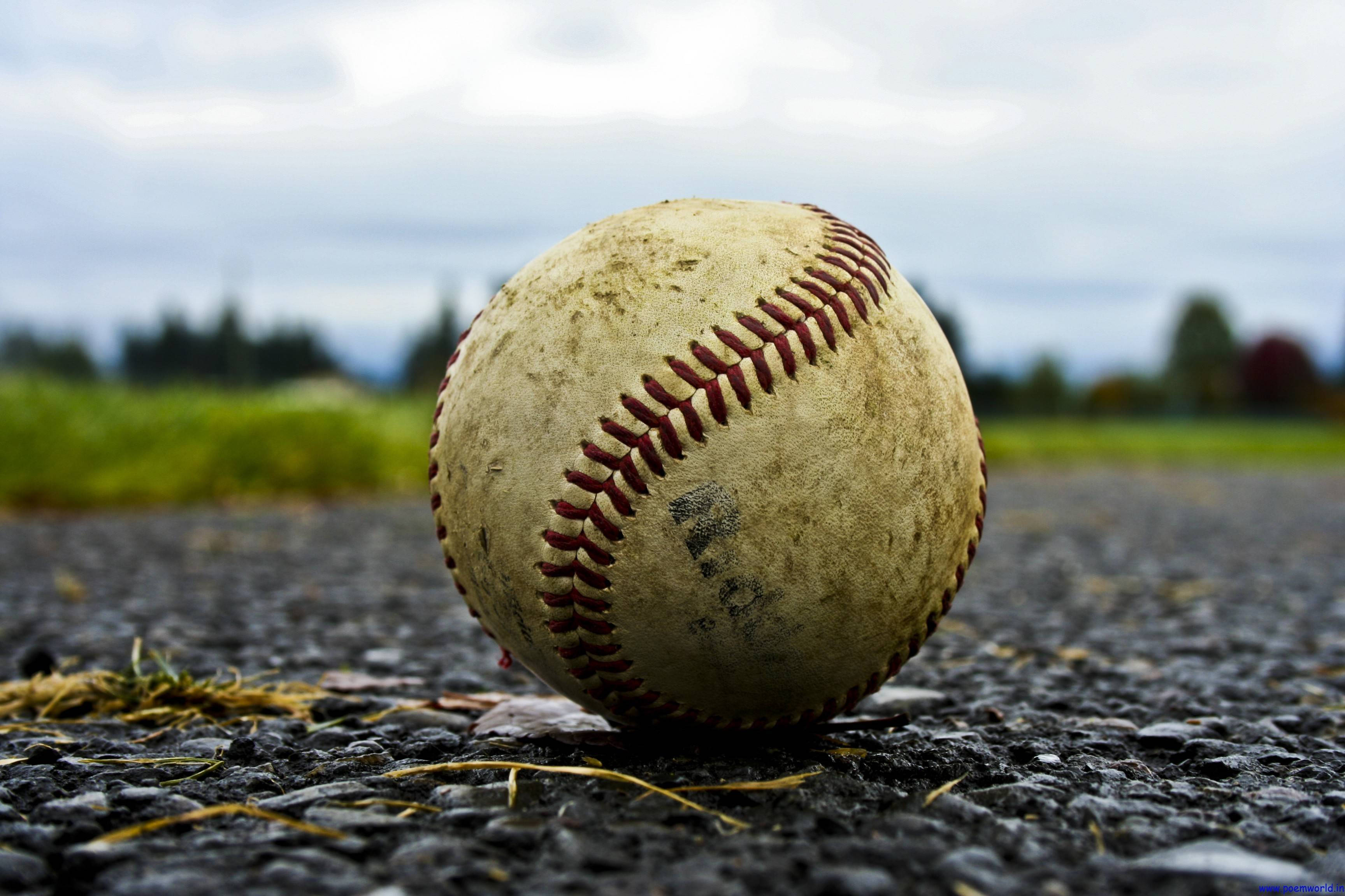 Download Cute Softball With Dirt Wallpaper