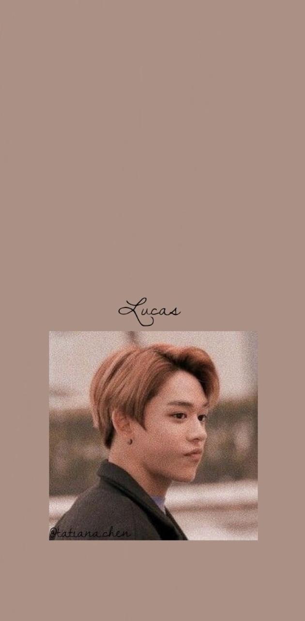 Lucas from NCT with a brown background - NCT