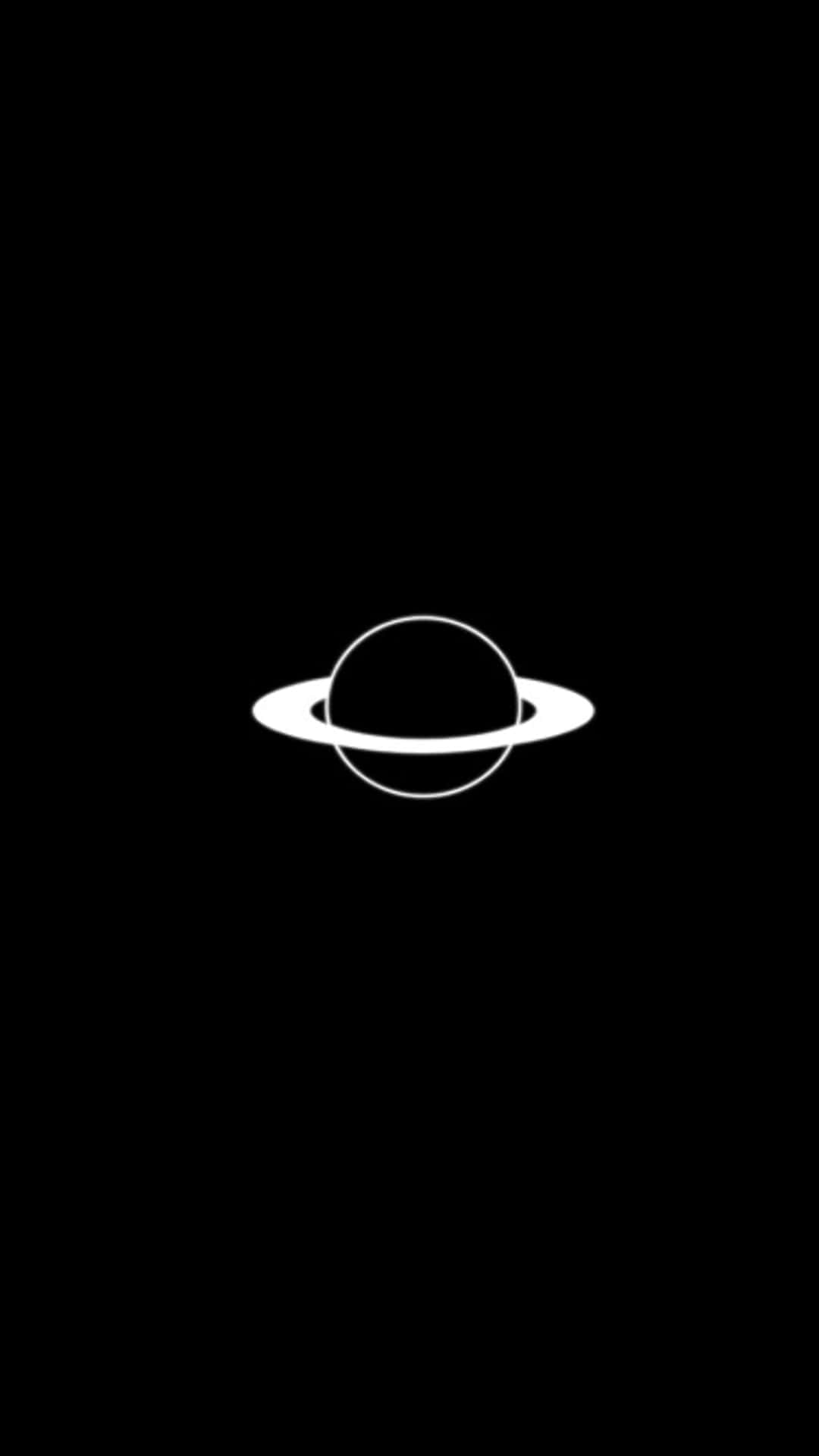 A black background with a white picture of Saturn - Saturn