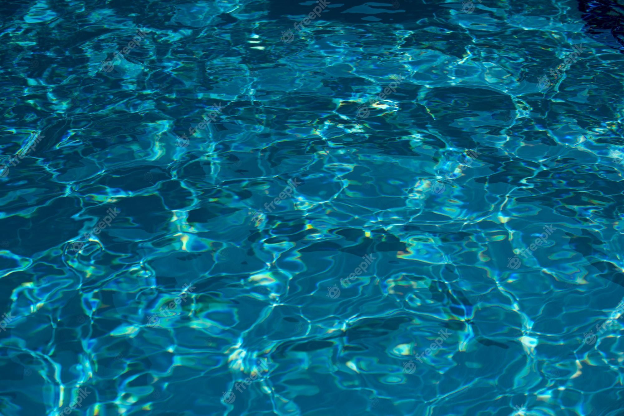 The surface of the pool is clean and blue - Swimming pool