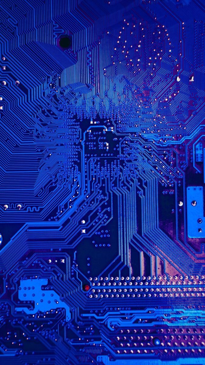 A close up of an electronic circuit board - Technology