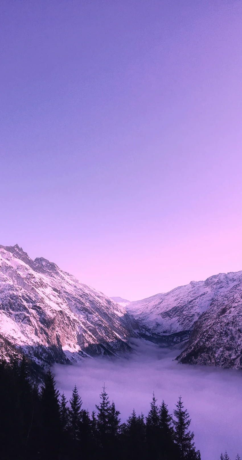 IPhone wallpaper of a purple sunset over a snowy mountain - Scenery