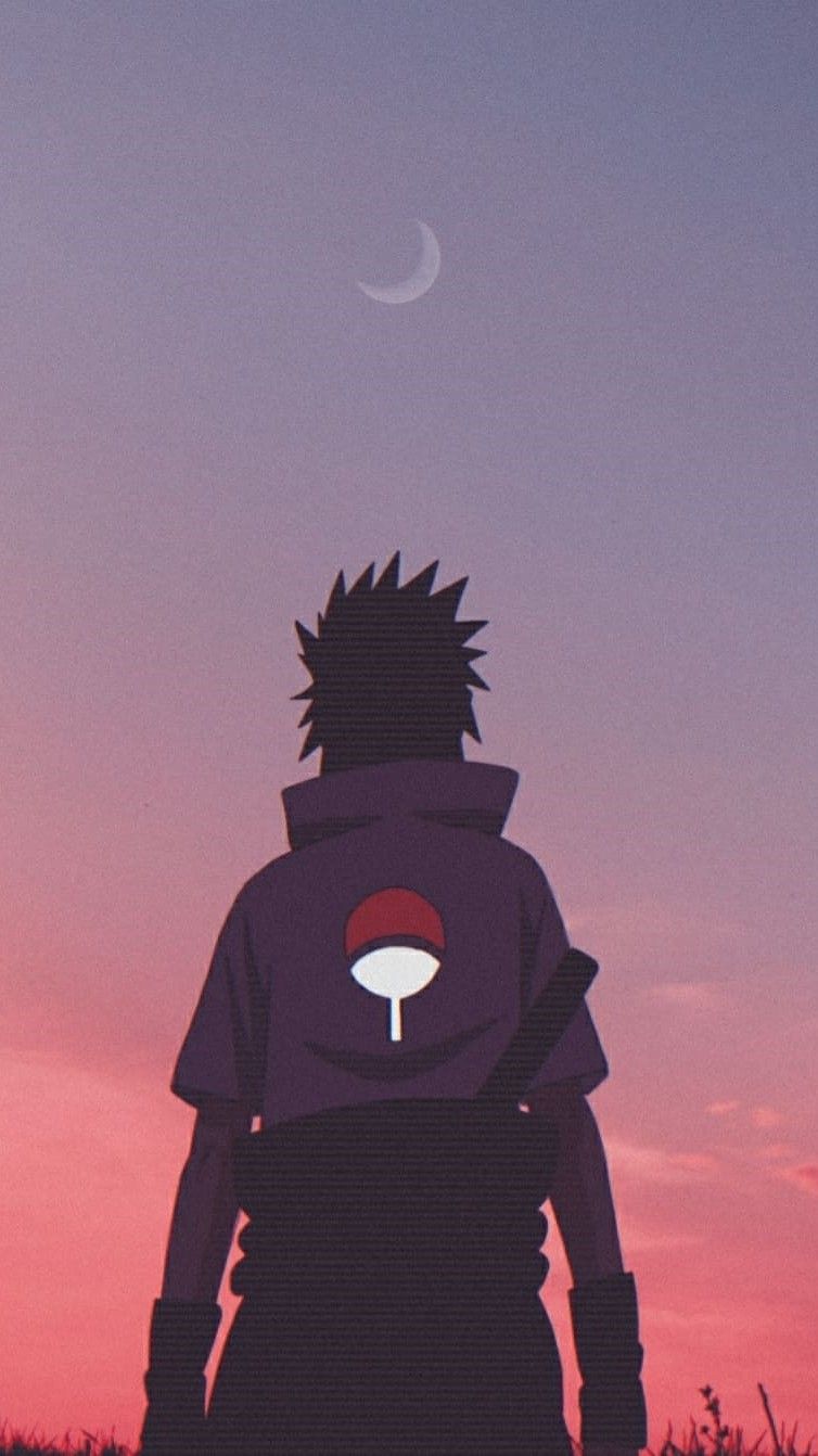 A person standing in the middle of an open field - Sasuke Uchiha