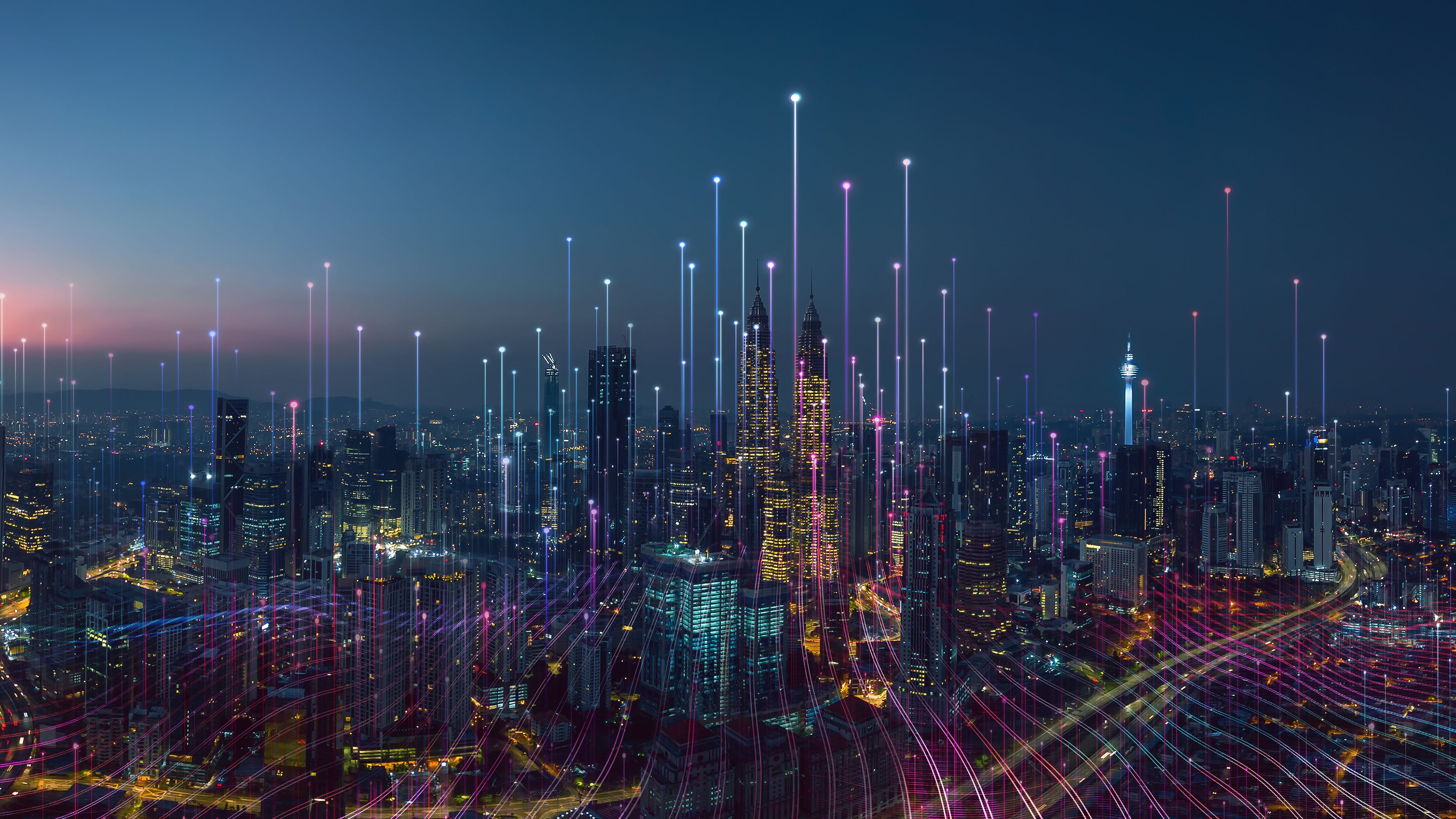 A city skyline with many lines of light - Technology