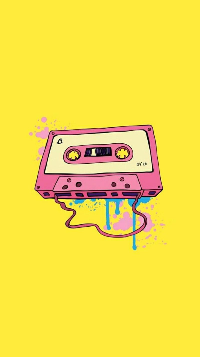 A cassette tape on yellow background - Technology