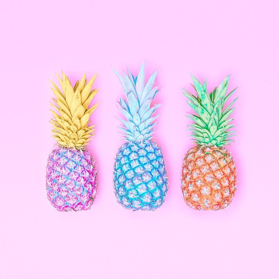 Three pineapples in a row, painted in pastel colors - Pineapple
