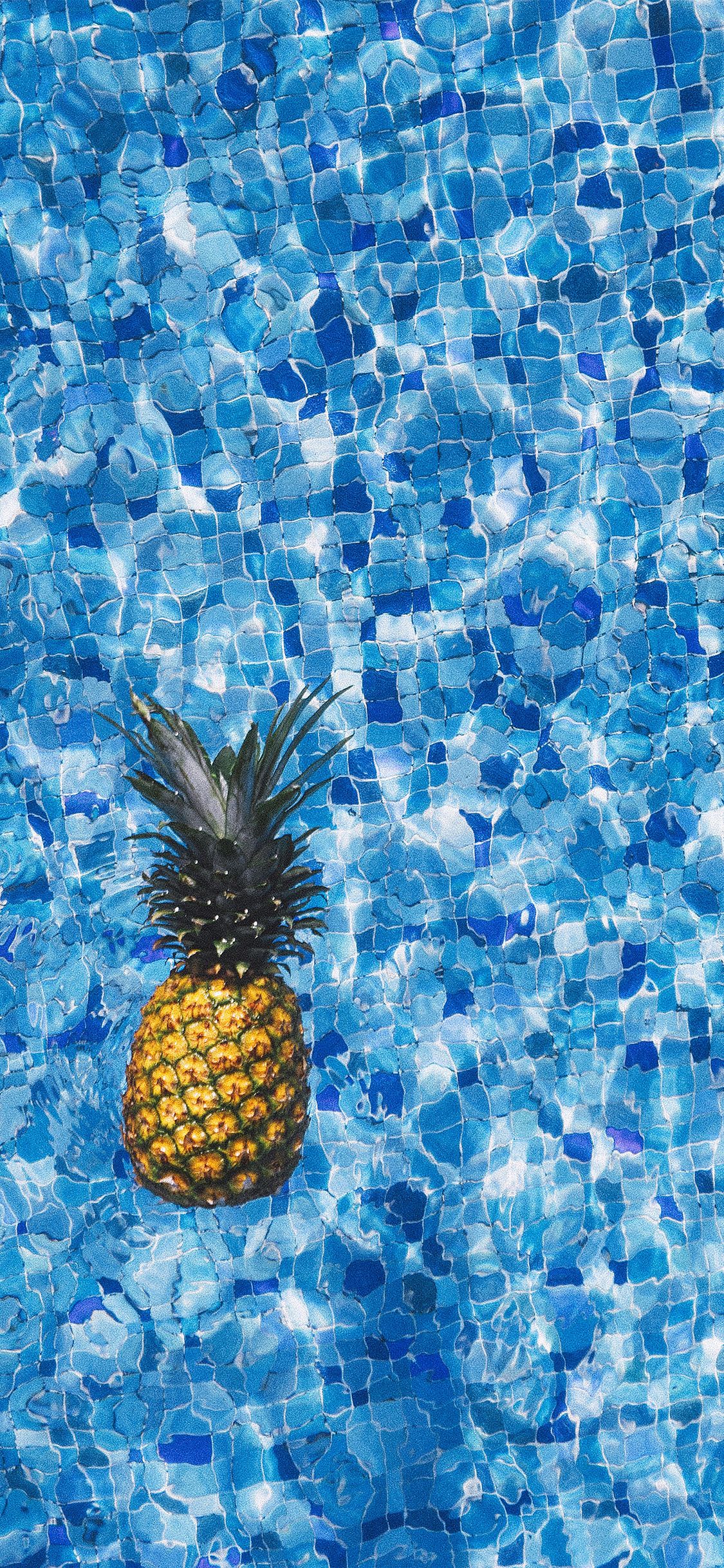 IPhone wallpaper of a pineapple floating in a pool - Pineapple