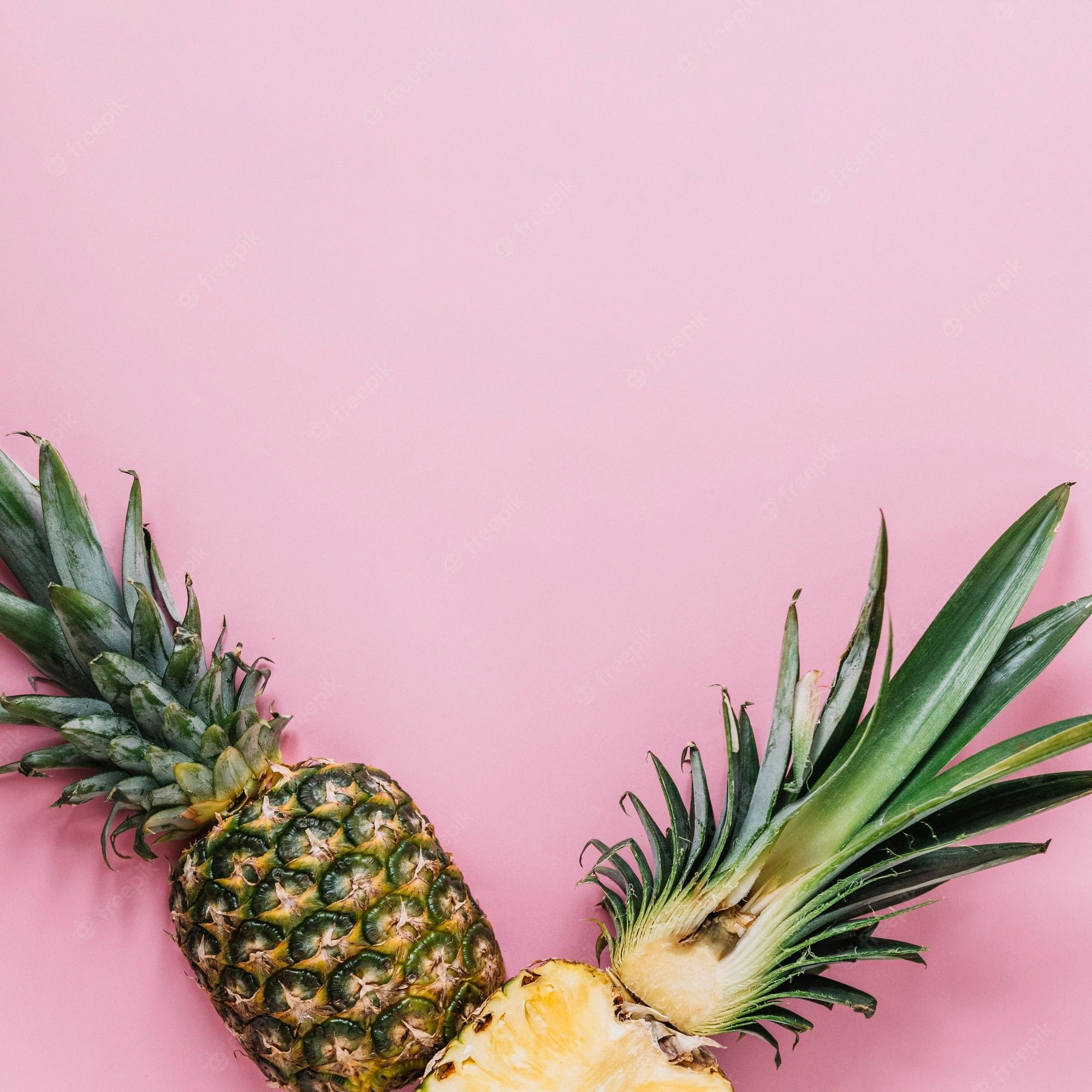 A pineapple and two slices of it on top - Pineapple