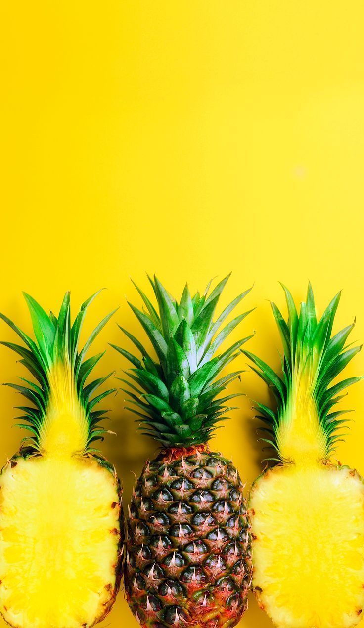 Three pineapples on a yellow background - Pineapple