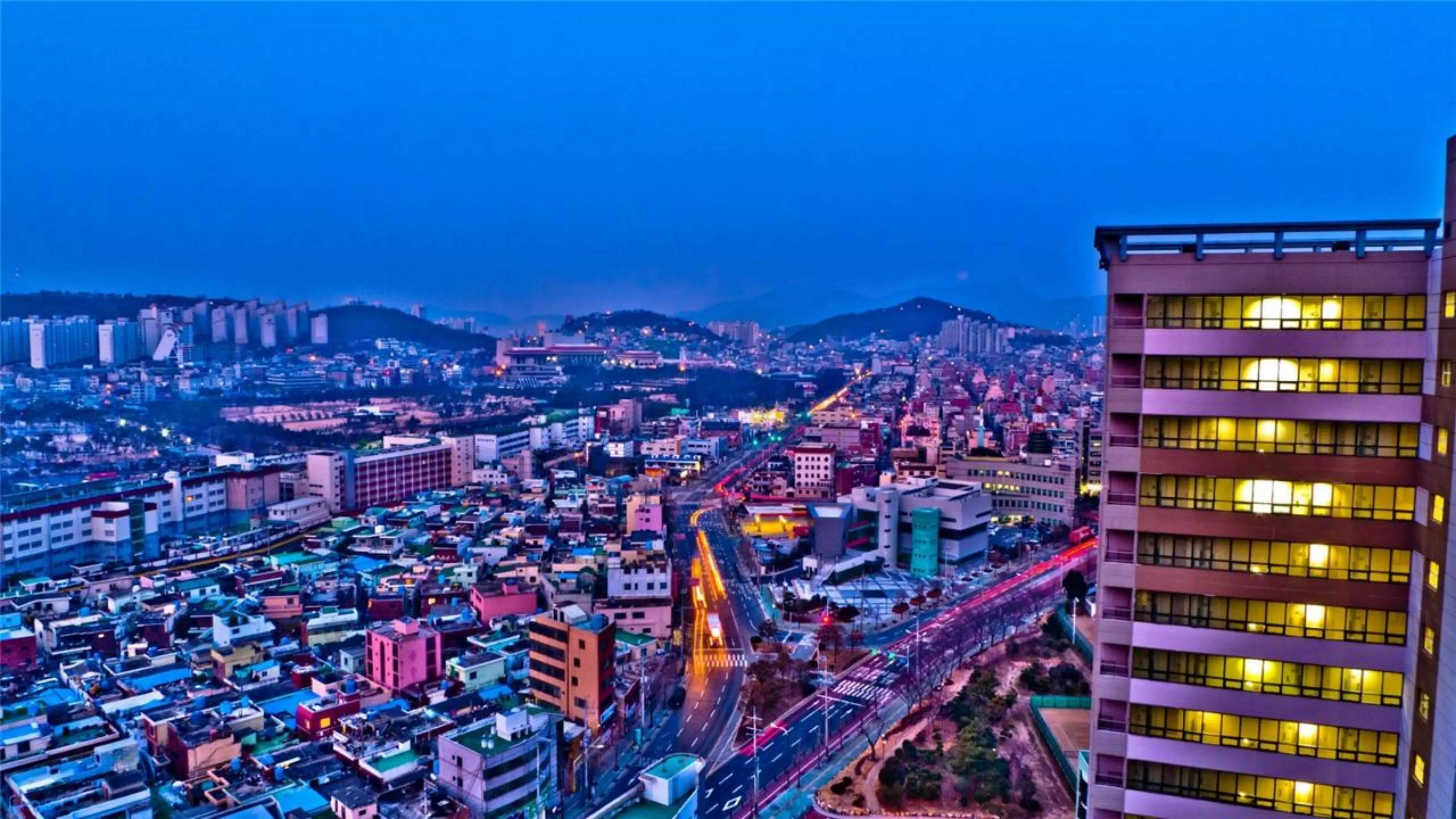 A city at night with many buildings - Seoul