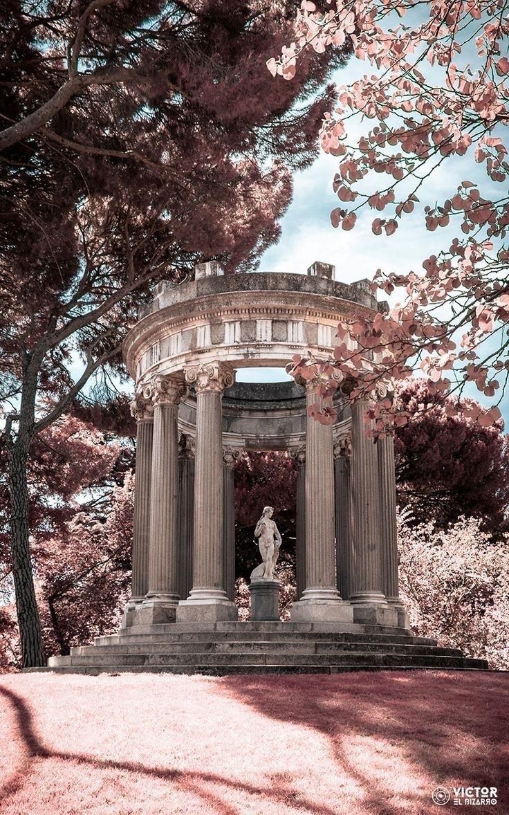 A temple with a statue of a woman in the middle, surrounded by trees - Angelcore