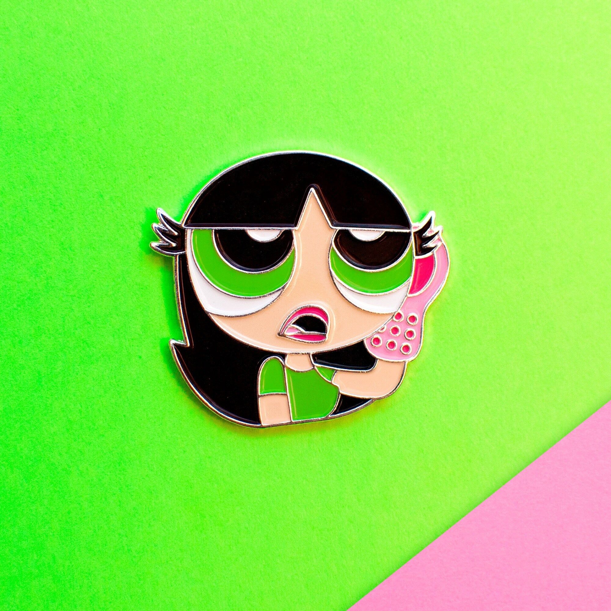 A pin that has an image of the powerpuff girls - Buttercup