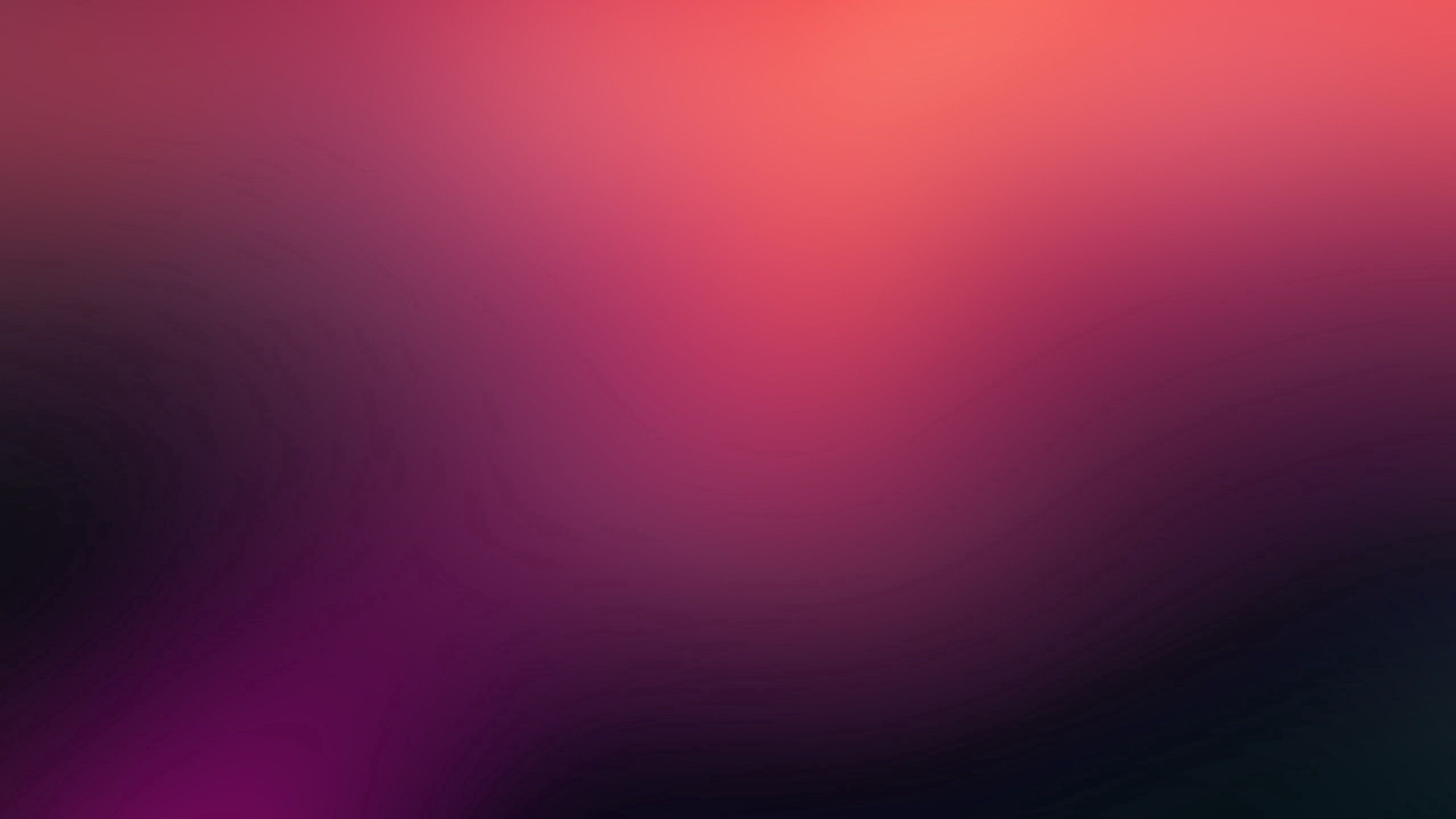 A blurred image of a pink and purple background - 2560x1440