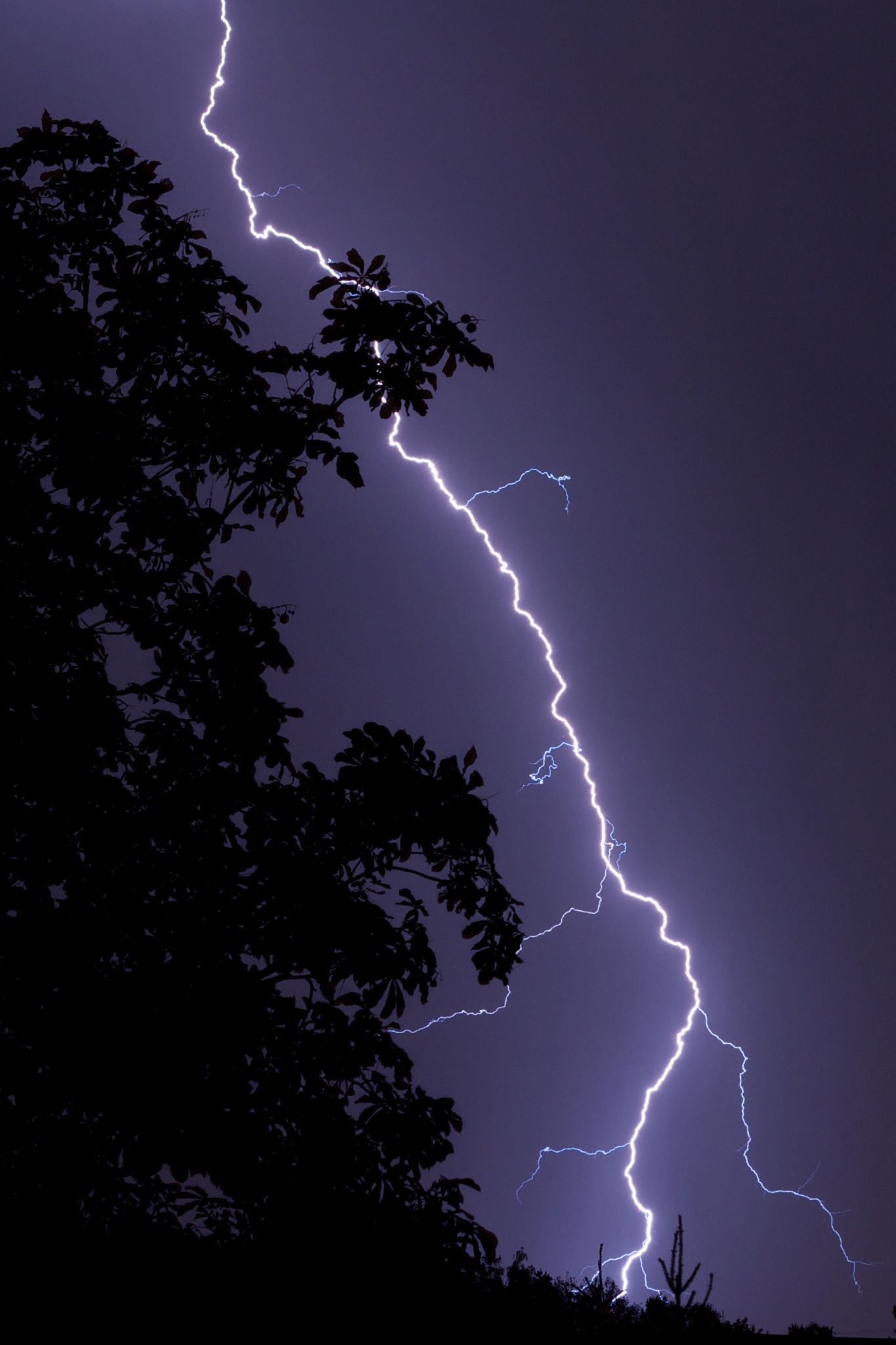 A lightning bolt is seen in the sky - Storm, lightning