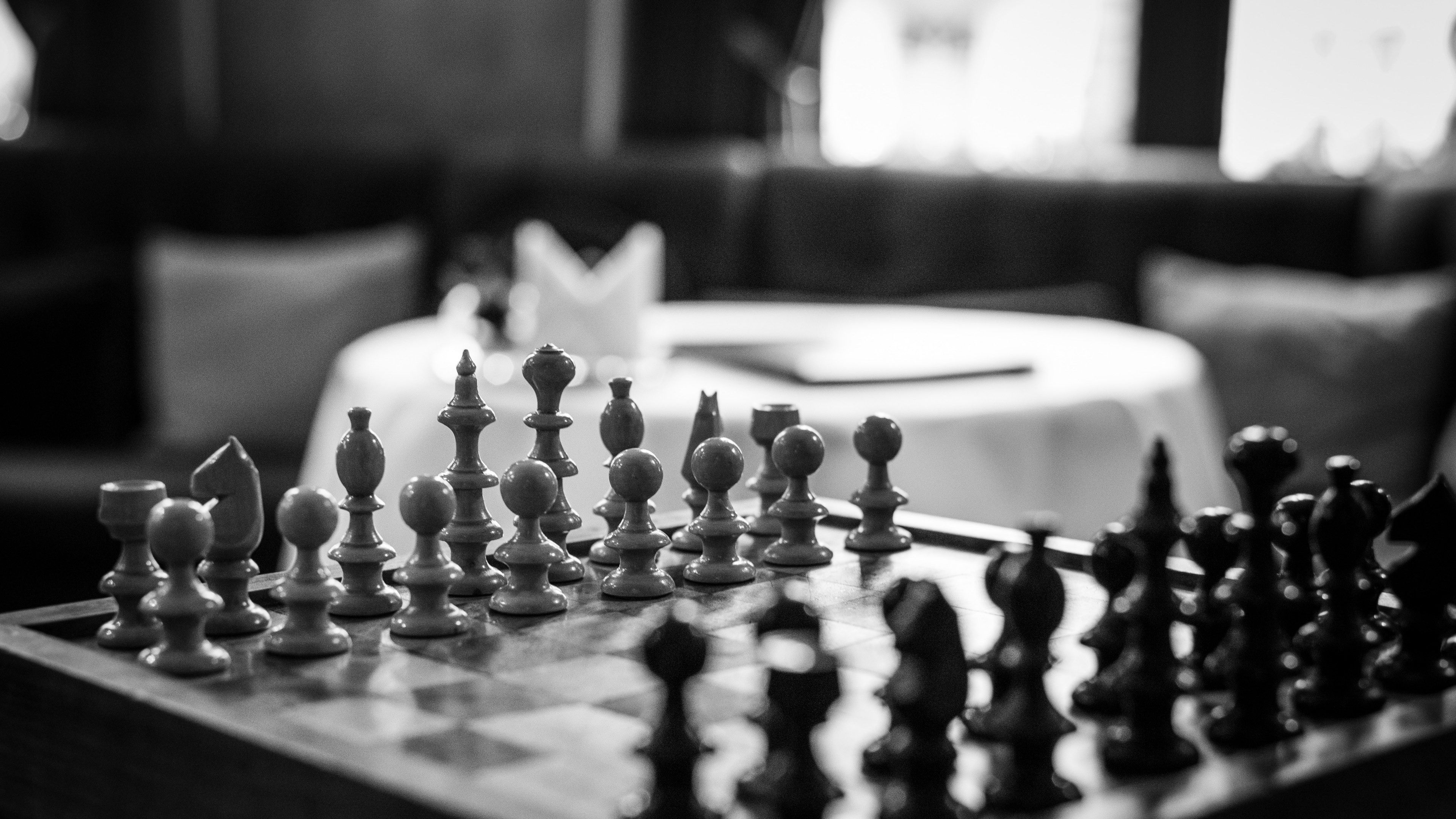 Wallpaper / a black and white photo of a chess board, _black white chess game 4k wallpaper free download