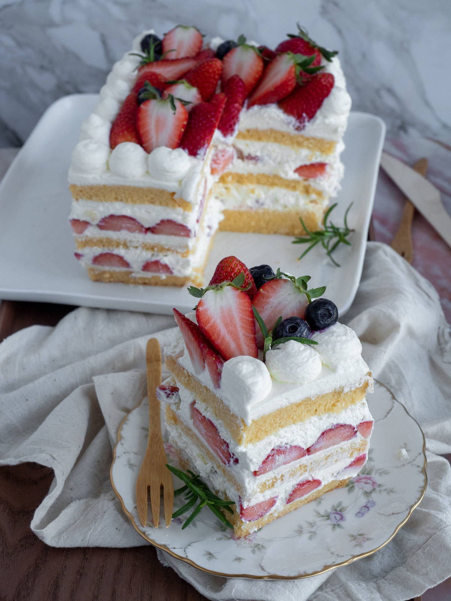 A cake with strawberries and cream on top - Cake