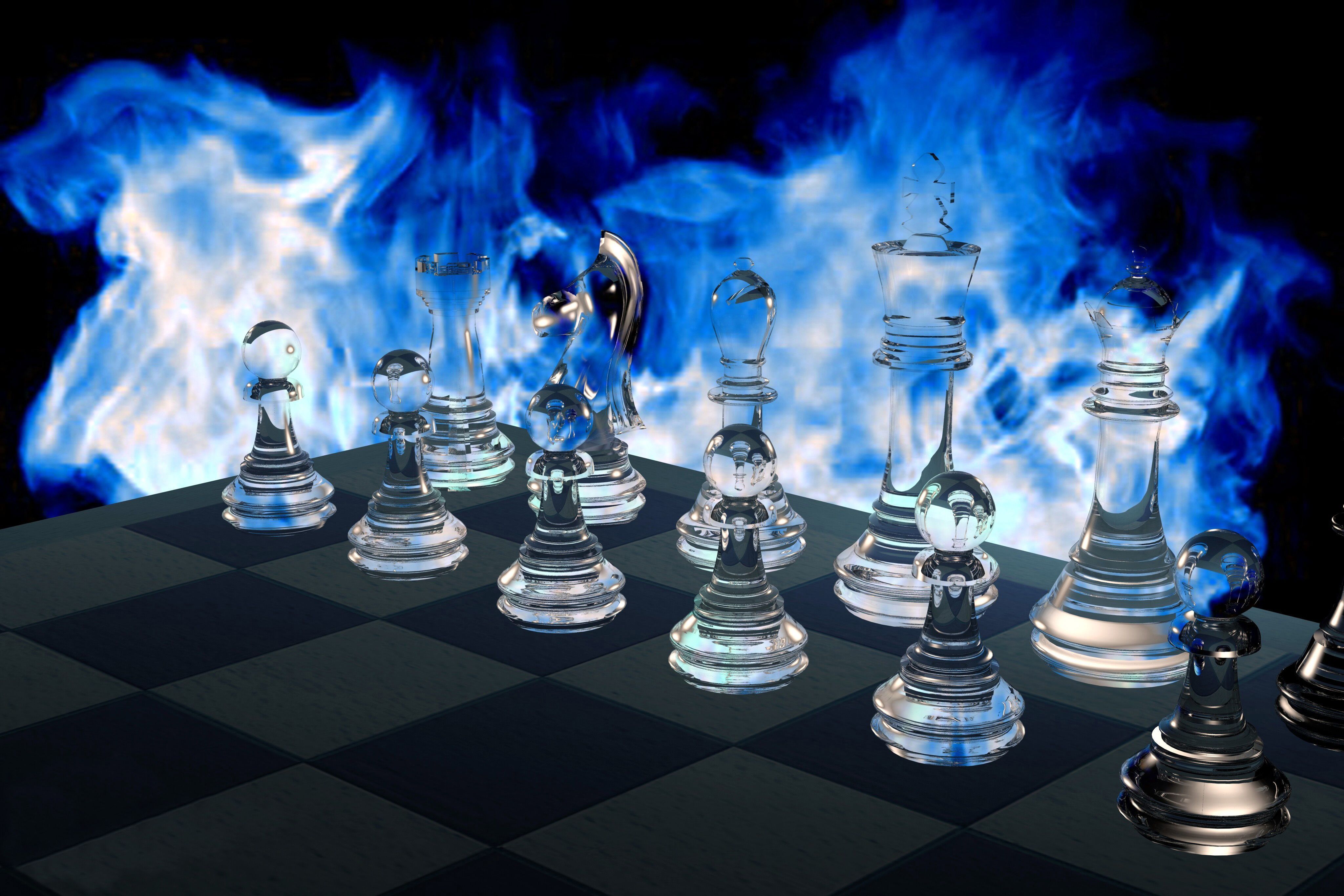 A chess board with flames coming out of it - Chess