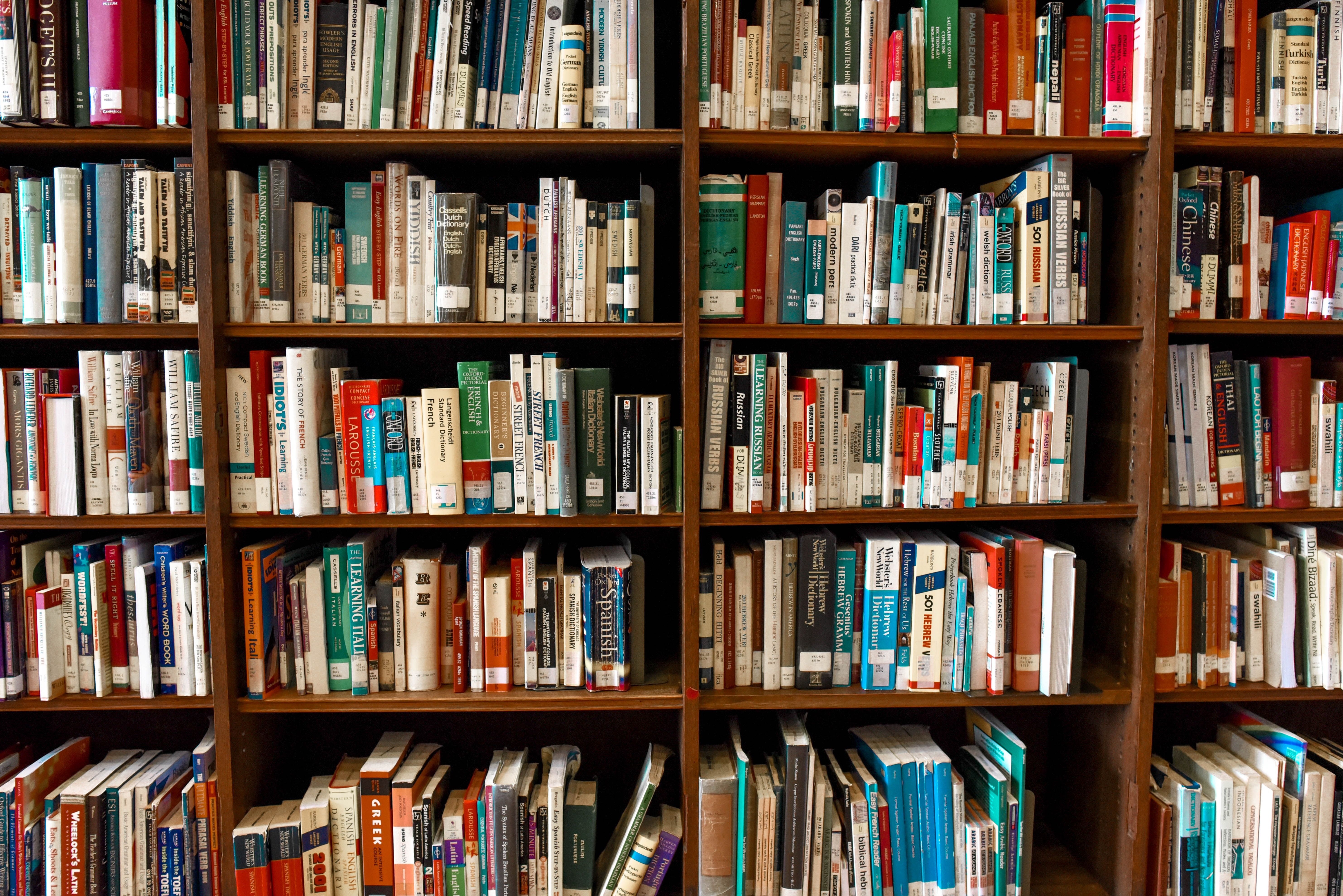 A bookshelf filled with many books on it - Bookshelf