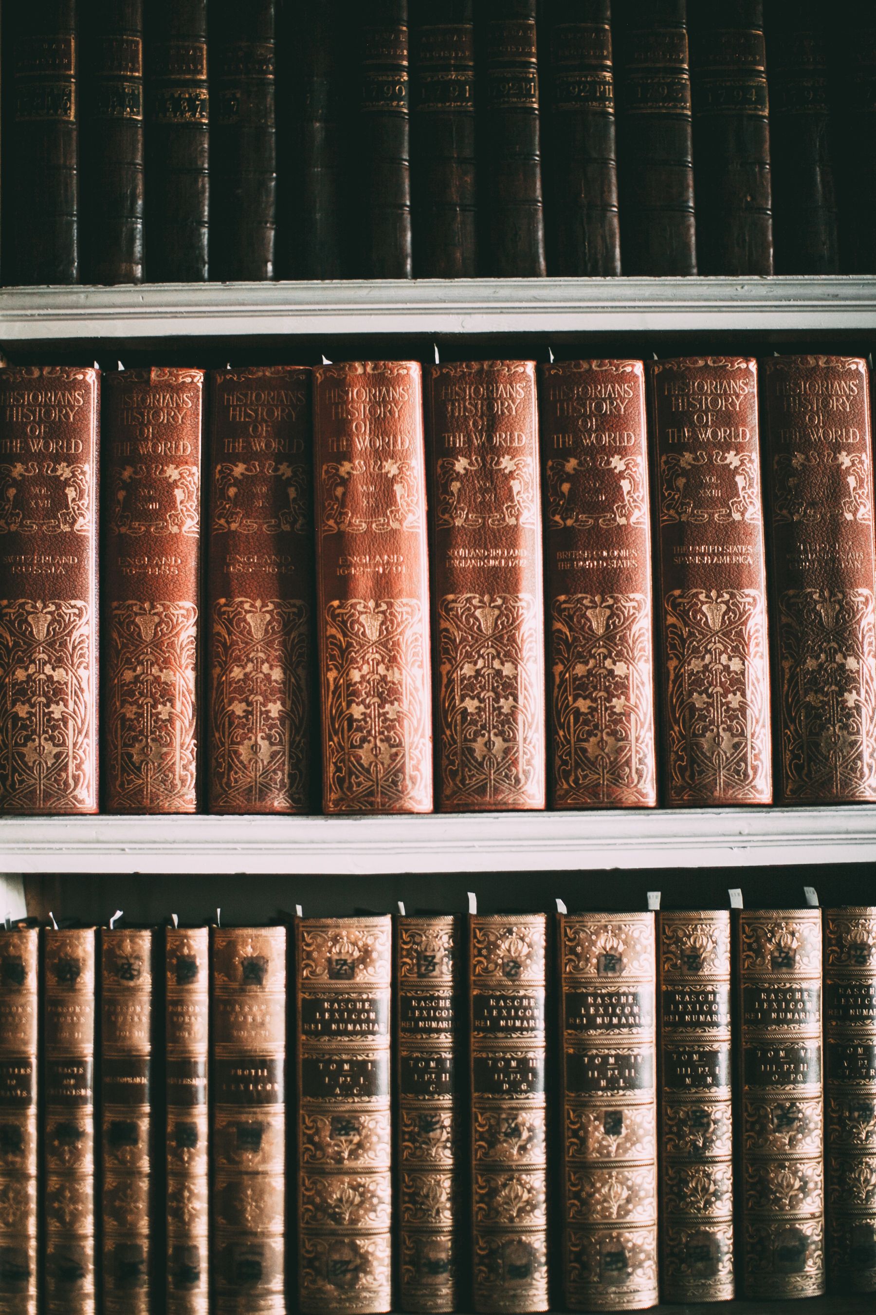 A book shelf with many different books on it - Bookshelf