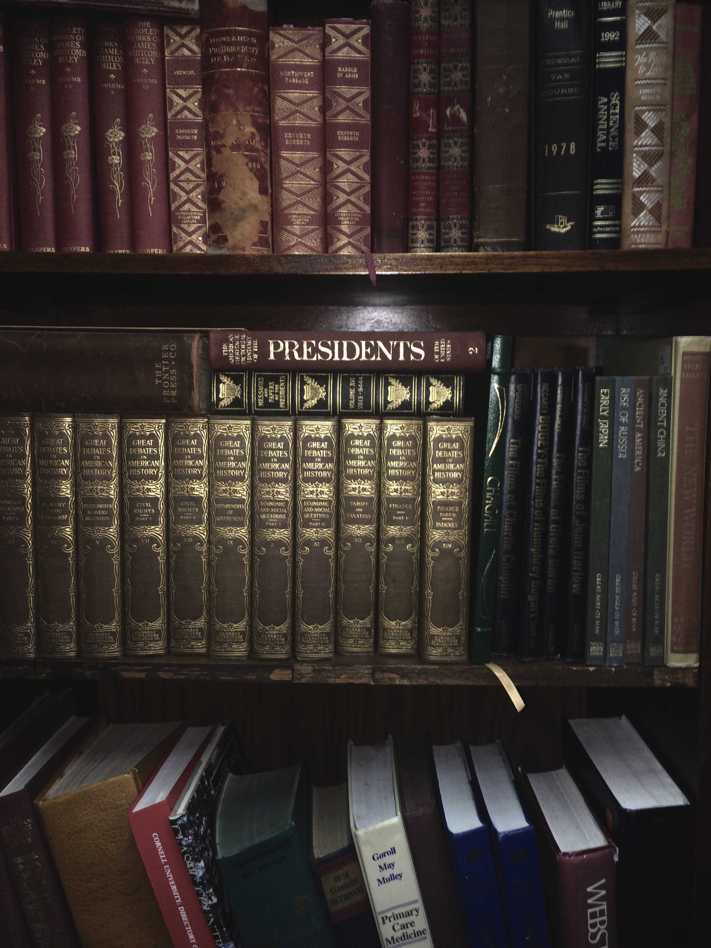 A book shelf with many books on it - Bookshelf