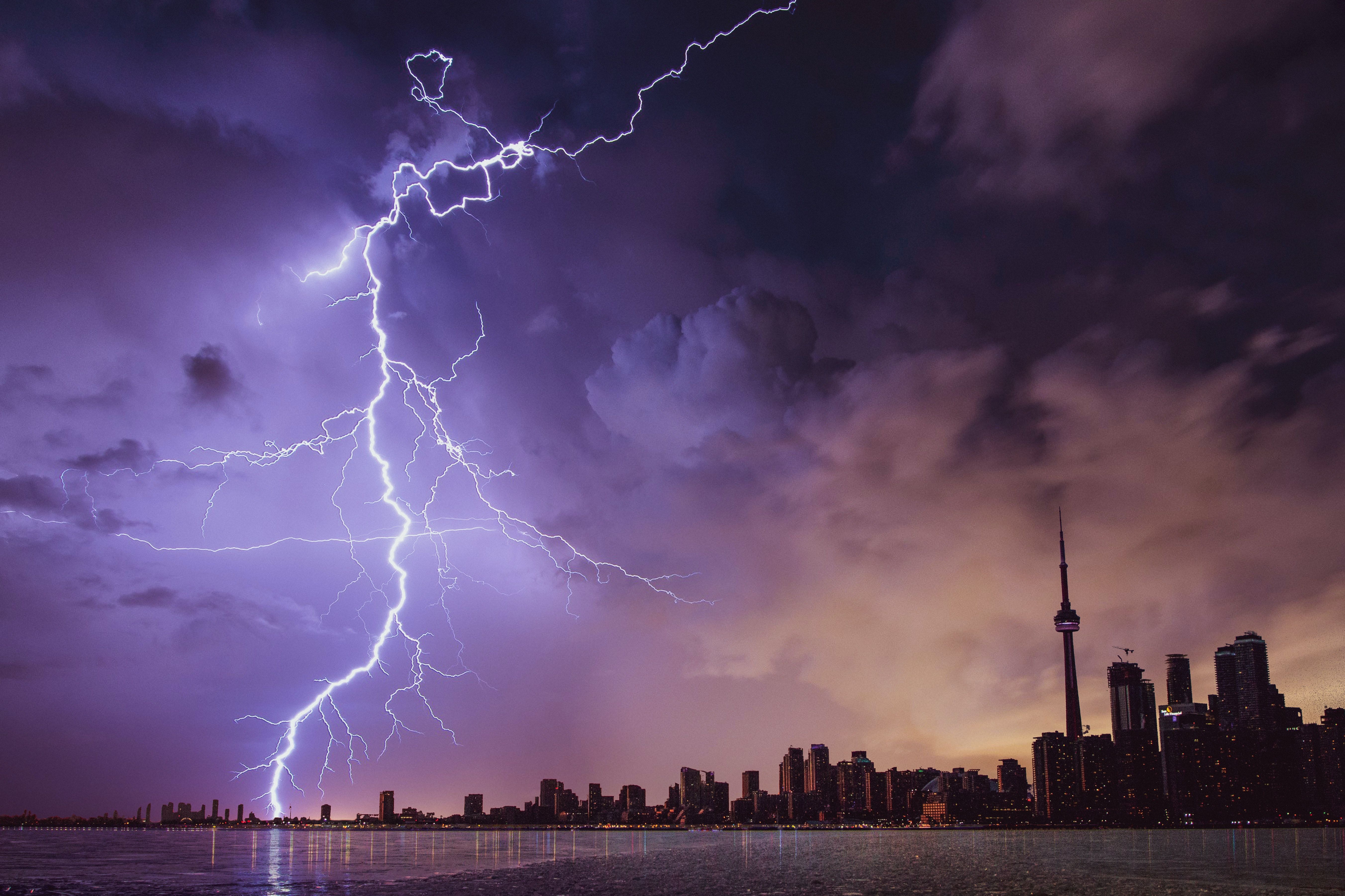 Lightning strikes over the city - Storm