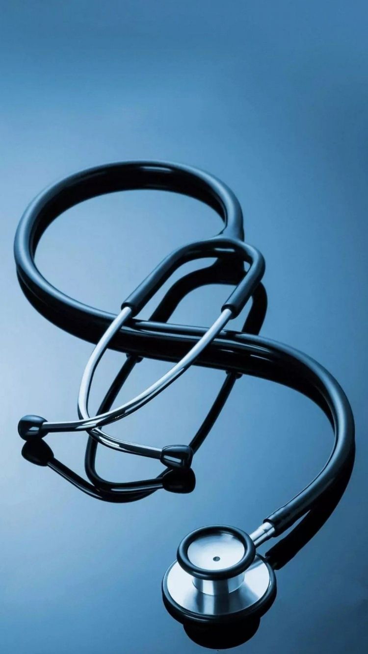 A stethoscope on a blue background - Medical