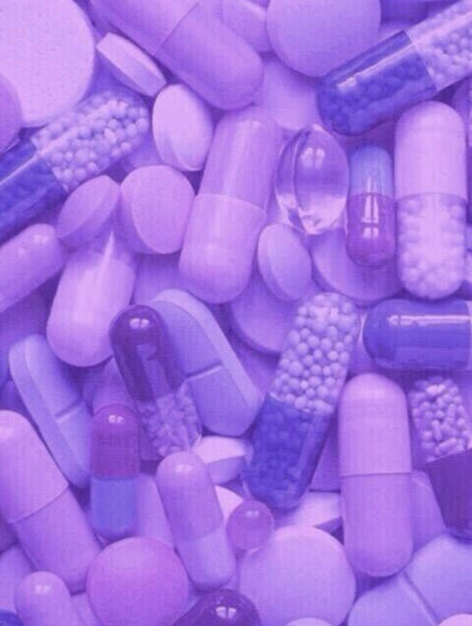 A pile of purple and blue pills - Medical
