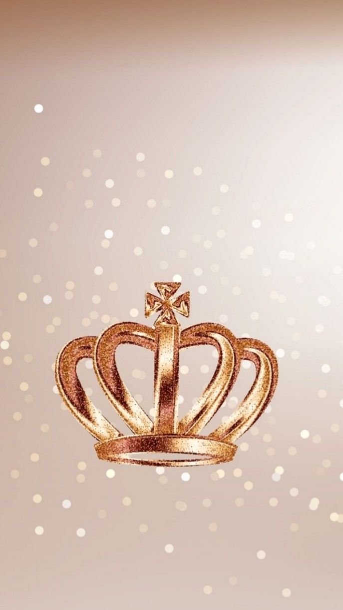 A gold crown on top of some sparkles - Crown
