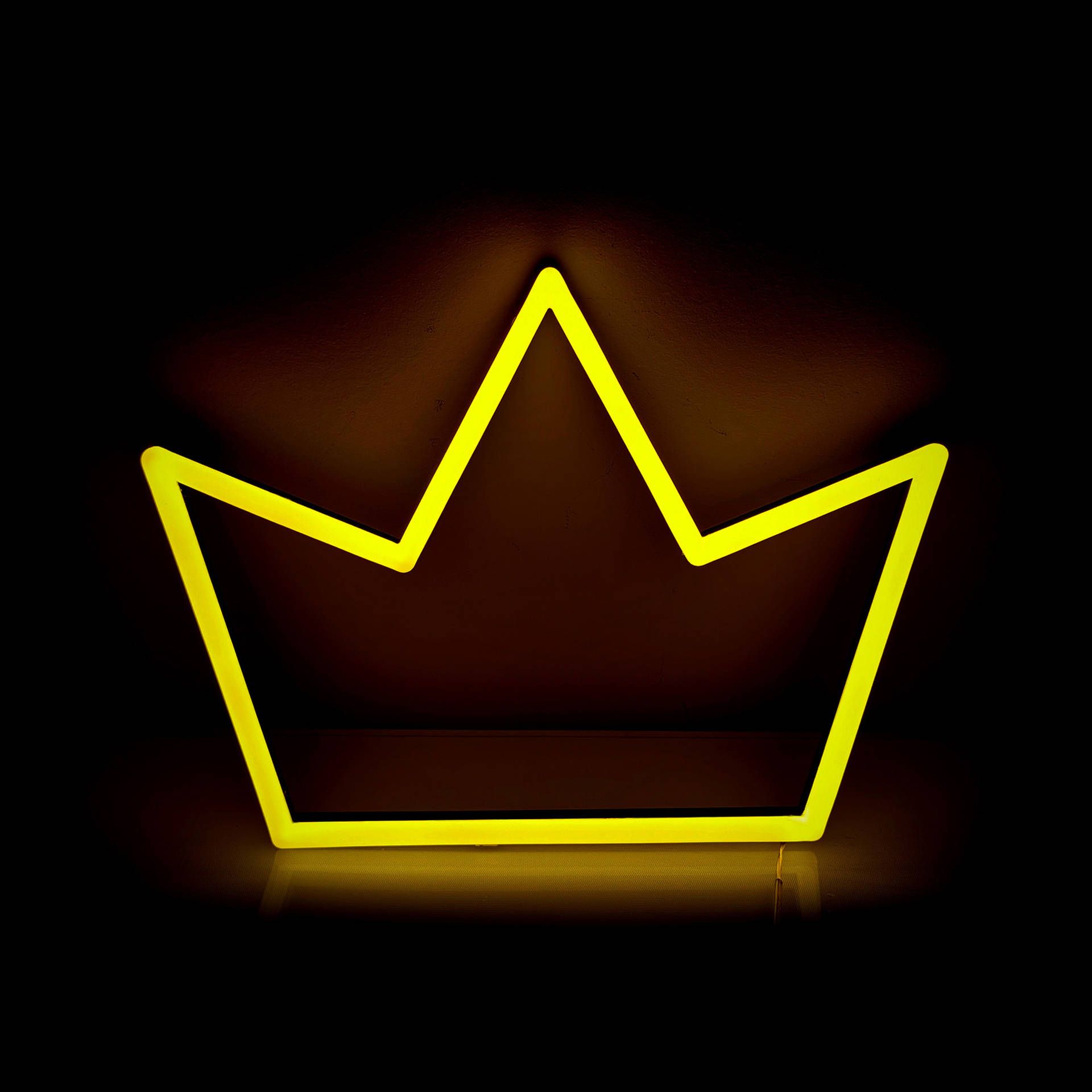 A neon sign in the shape of a crown. - Neon, crown