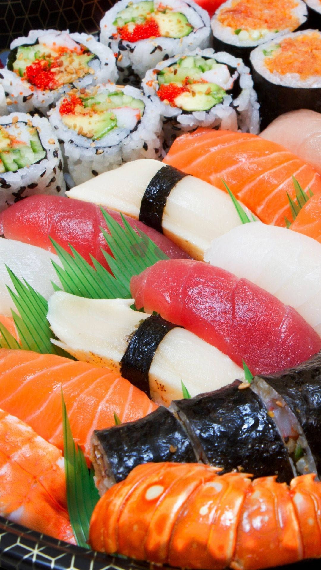 A tray of sushi with various types - Sushi