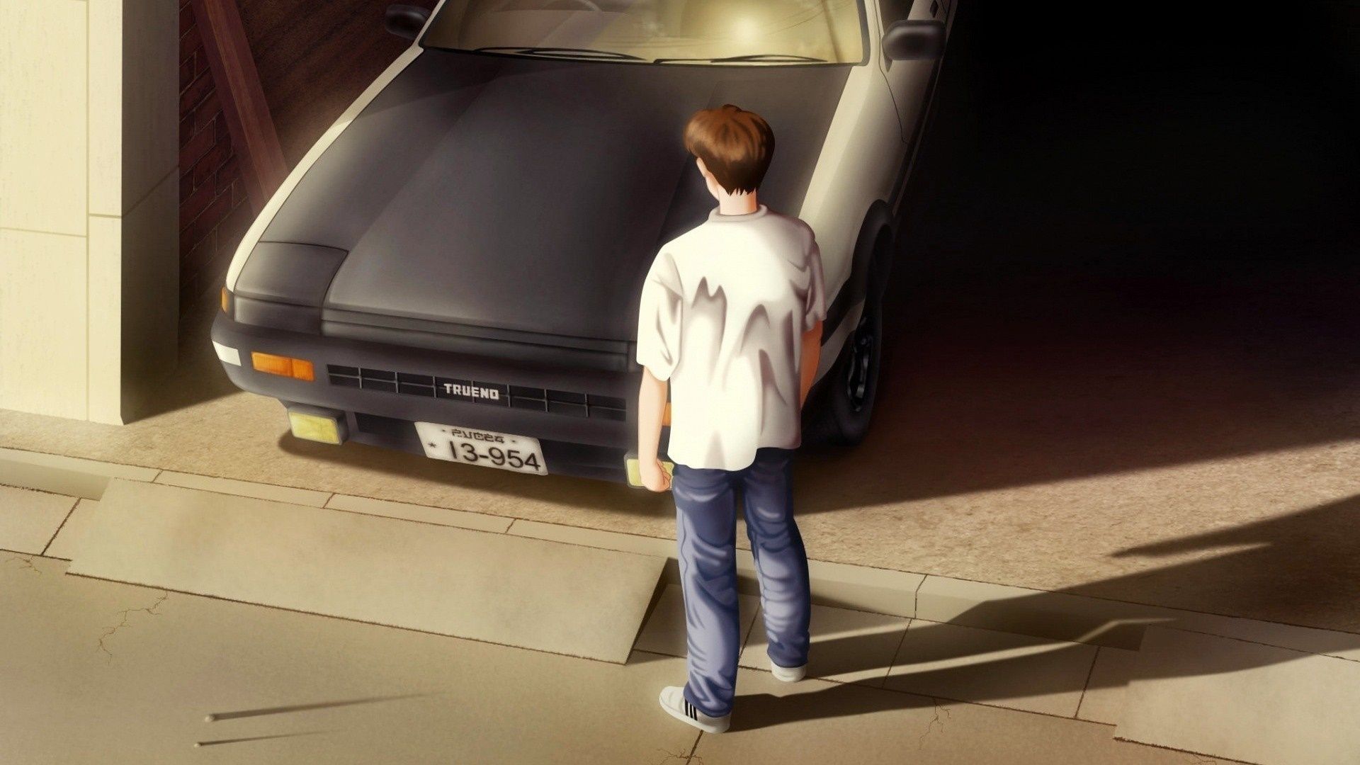 A man standing next to his car - Toyota AE86