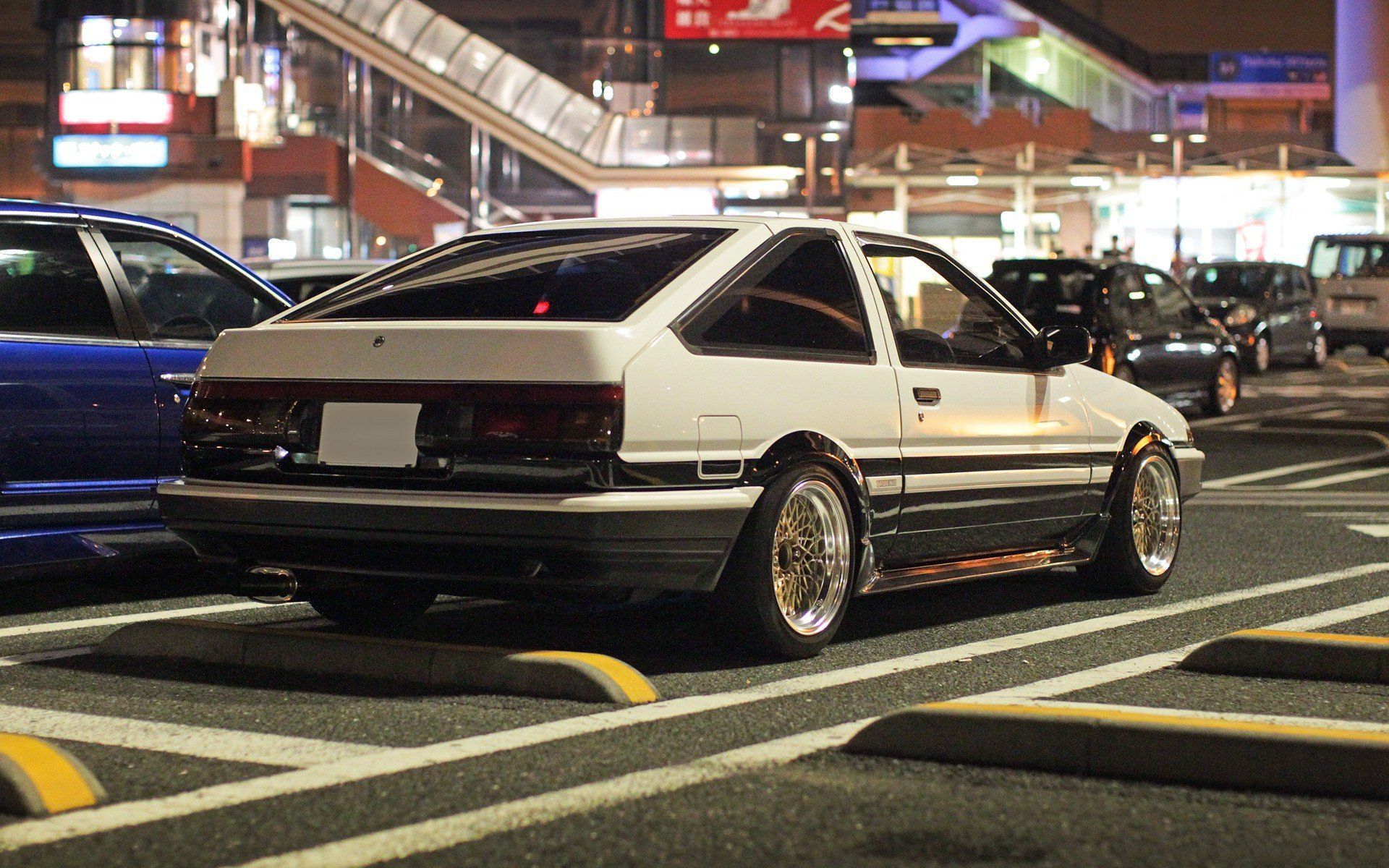 A car parked in the middle of an intersection - Toyota AE86