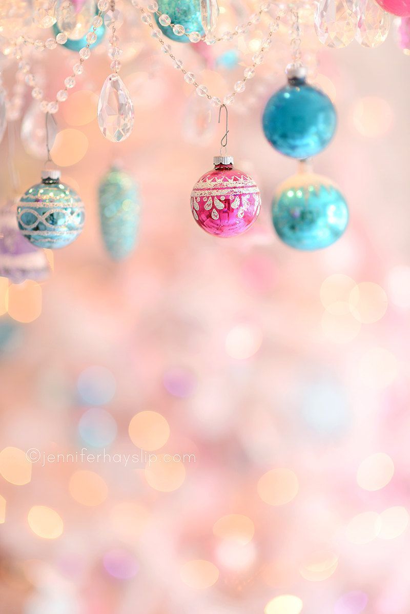 Pastel Christmas ornaments on a pink background with bokeh. - White Christmas