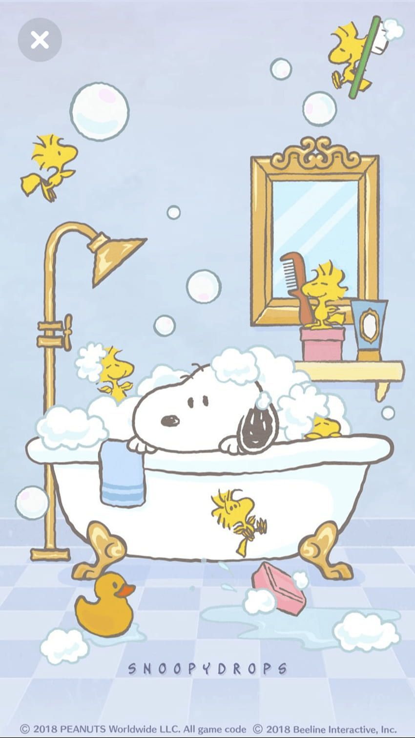 A cartoon dog sitting in a bathtub filled with bubbles. - Snoopy