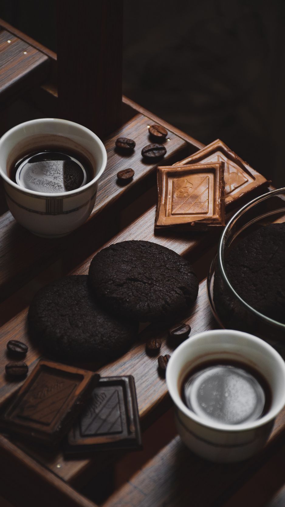 A table with cookies and cups of coffee - Oreo, chocolate