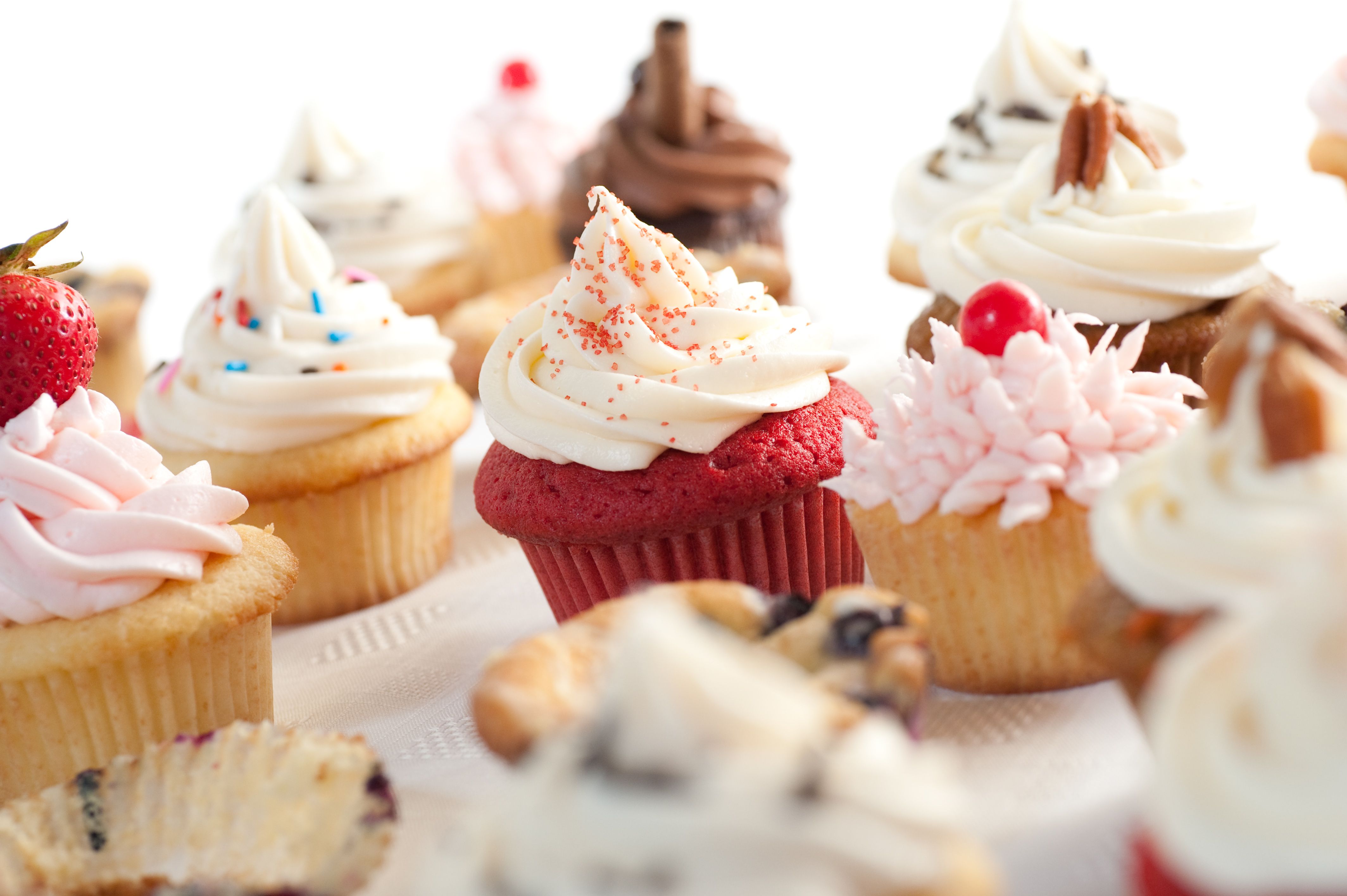 A table full of cupcakes and cookies - Cupcakes